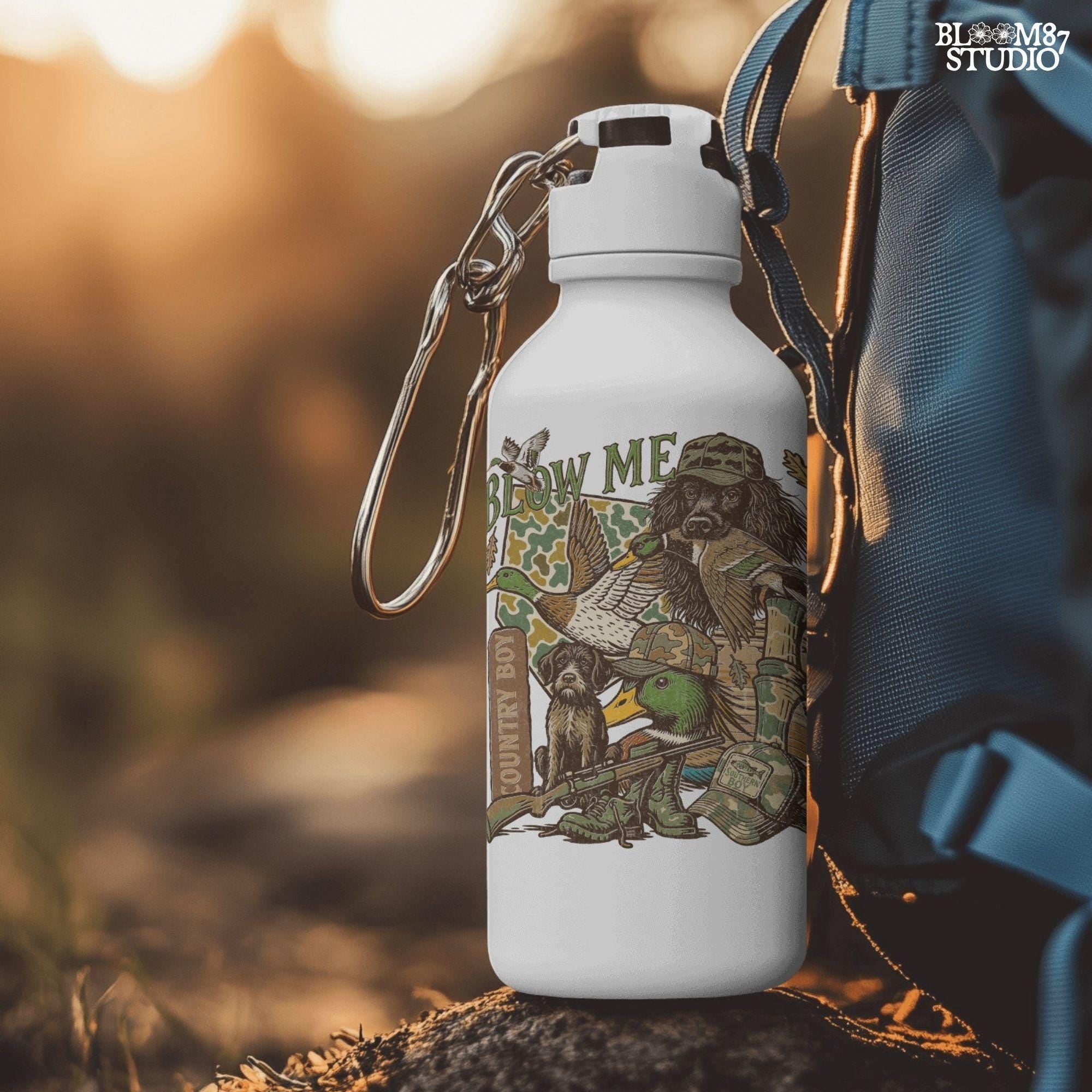 Retro collage of duck hunting elements including mallards, camo, duck dog, country boy rifle, and “Blow Me” southern humor quote.