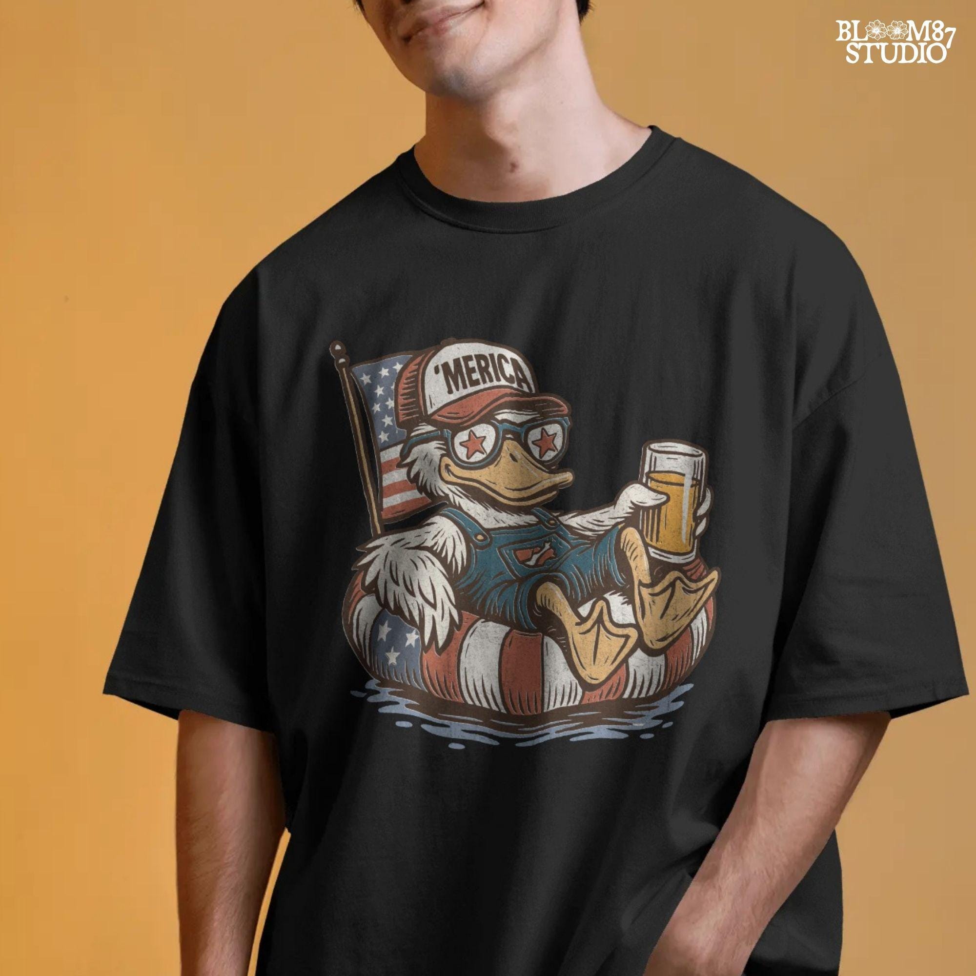 Cartoon duck lounging on a red, white, and blue floaty, wearing sunglasses and a ‘Merica cap, holding a beer with American flag background.