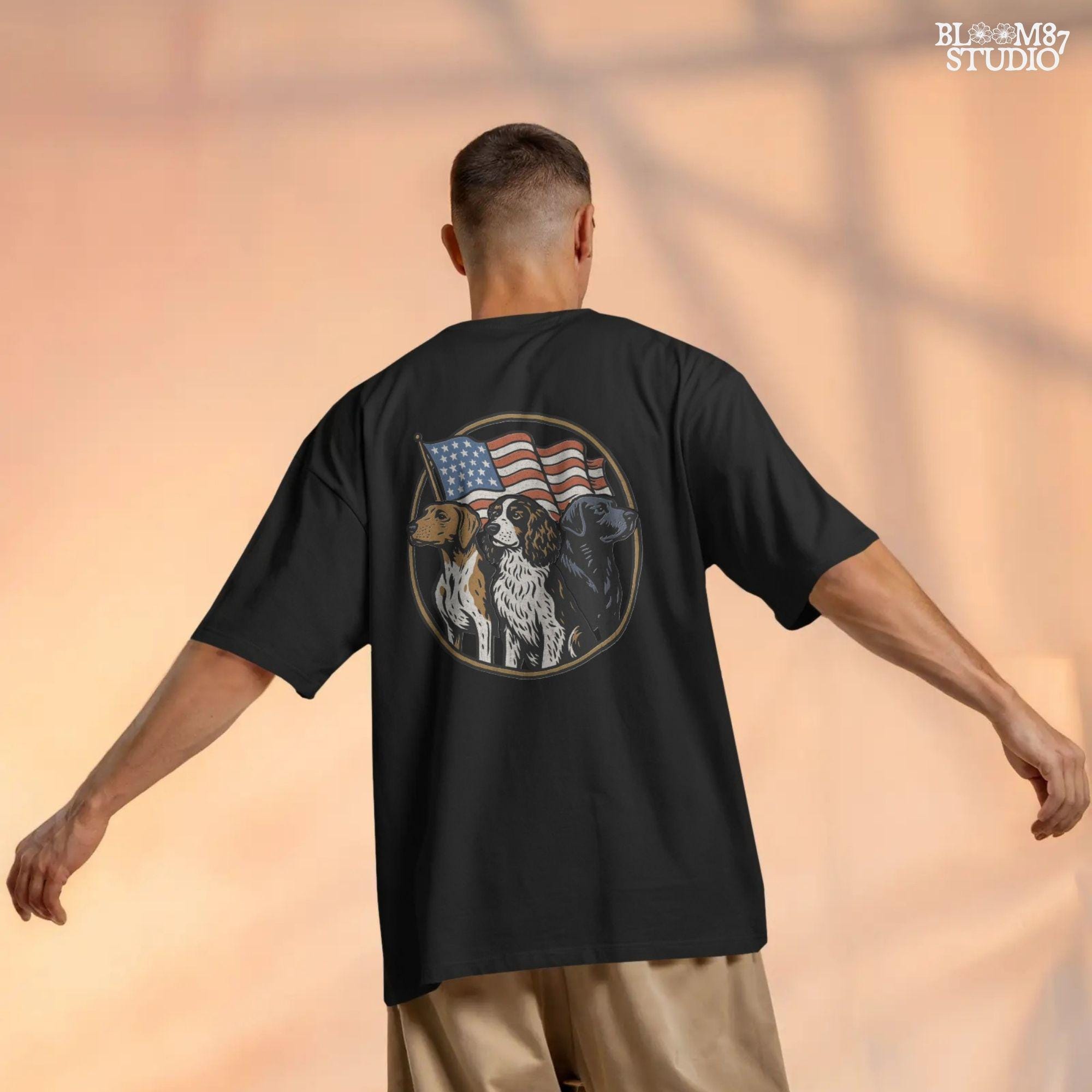 Illustration of three hunting dogs — Labrador, Spaniel, and Beagle — standing in front of a waving American flag, designed for patriotic dog lover sublimation projects.