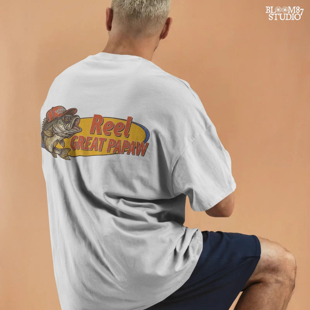 Vintage-style illustration of a bass fish wearing a red trucker hat with the phrase “Reel Great Papaw,” designed for sublimation and fishing-themed grandpa gifts.