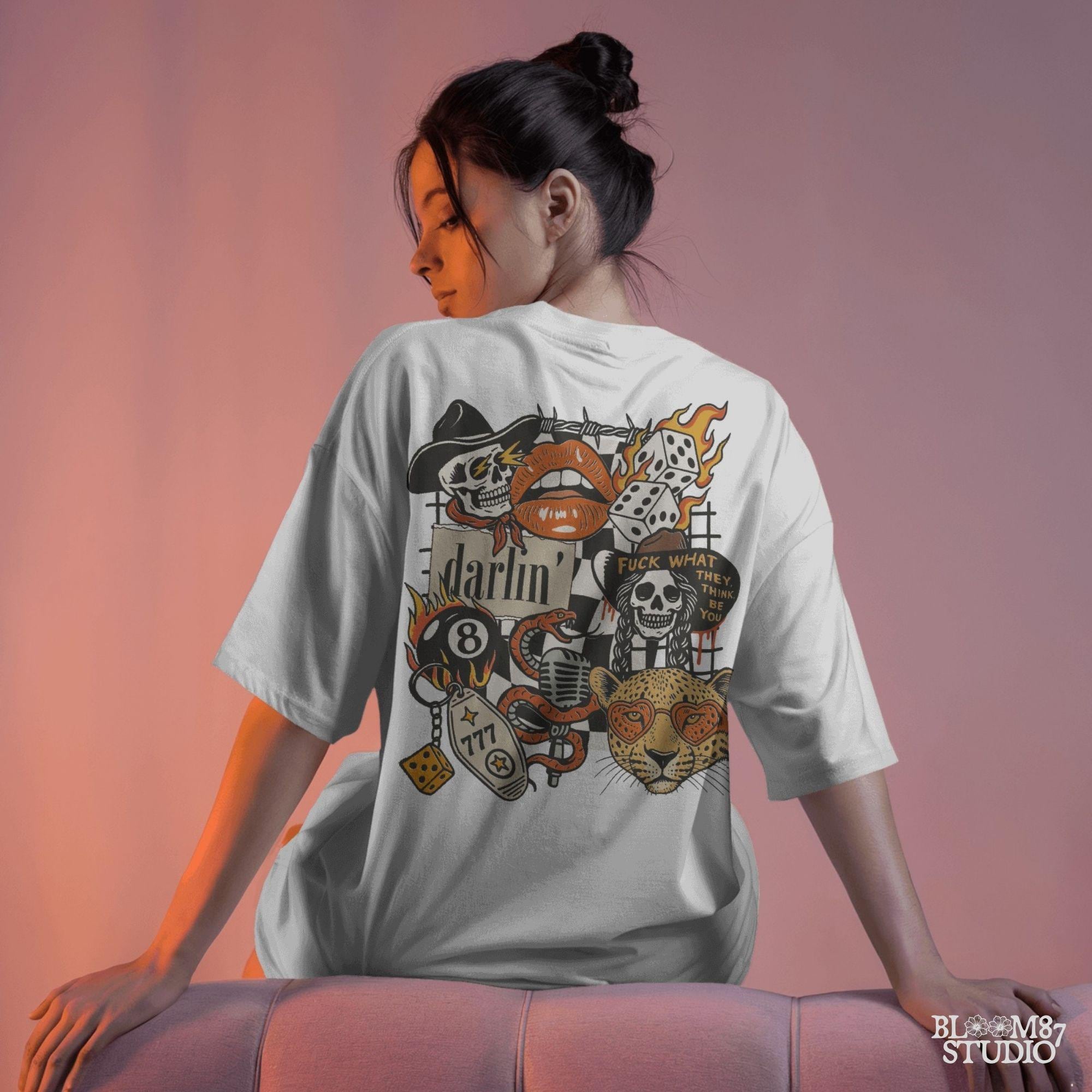 Western punk collage design featuring skulls, lips, leopard with heart glasses, snake and microphone, dice, barbed wire, and 777 tag.