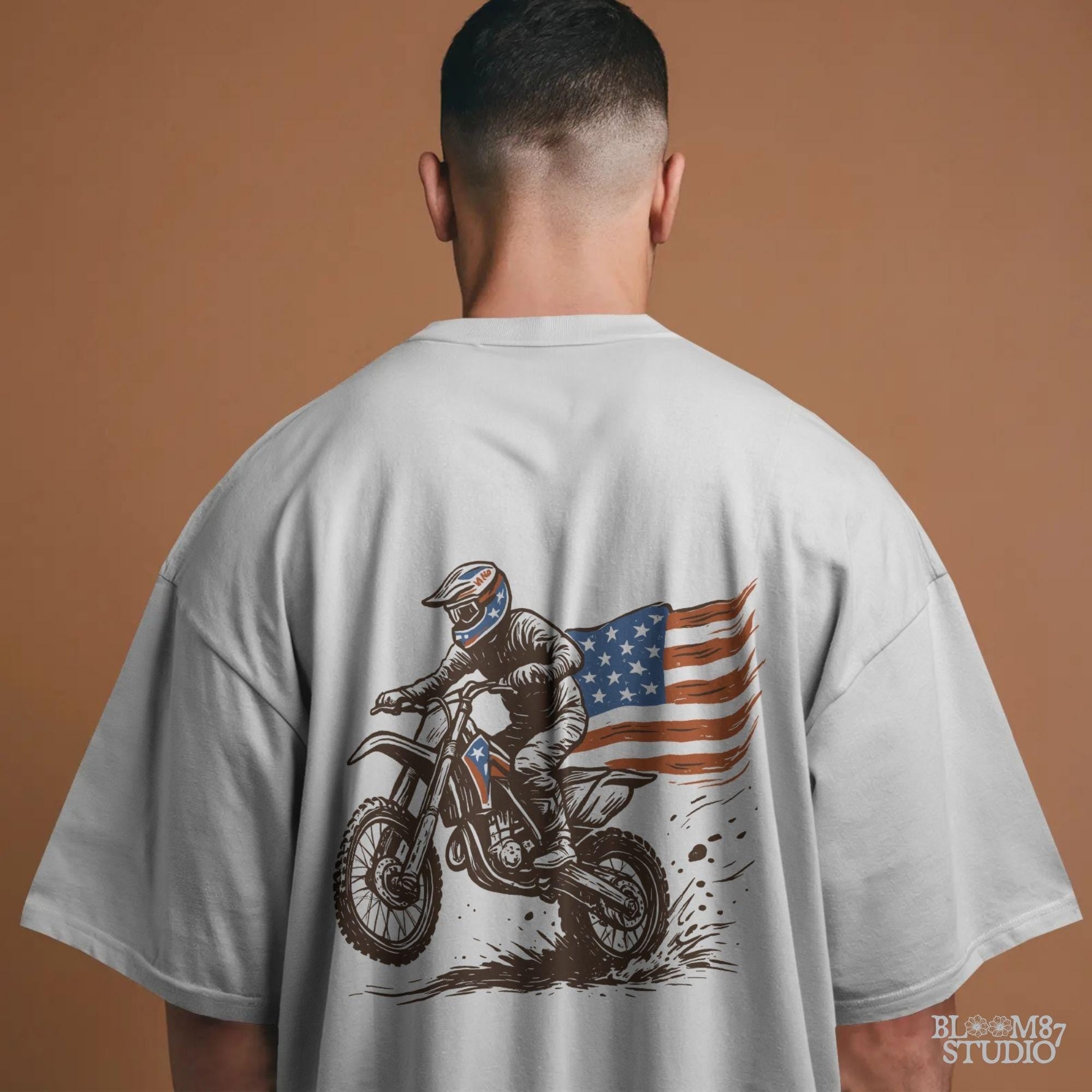 Patriotic motocross rider doing a dirt jump on a dirt bike with the American flag flowing behind, in a bold western vintage style illustration.