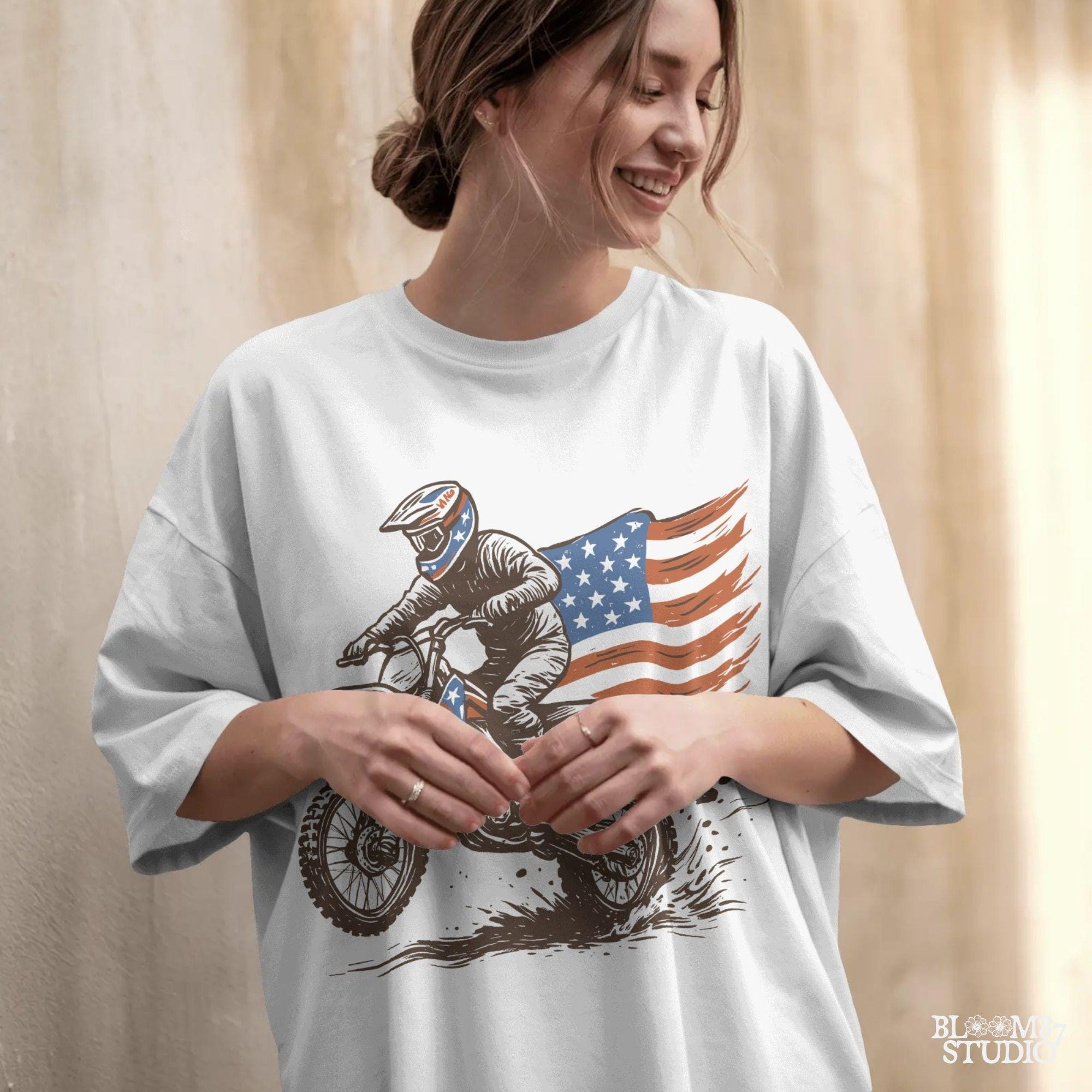 Patriotic motocross rider doing a dirt jump on a dirt bike with the American flag flowing behind, in a bold western vintage style illustration.