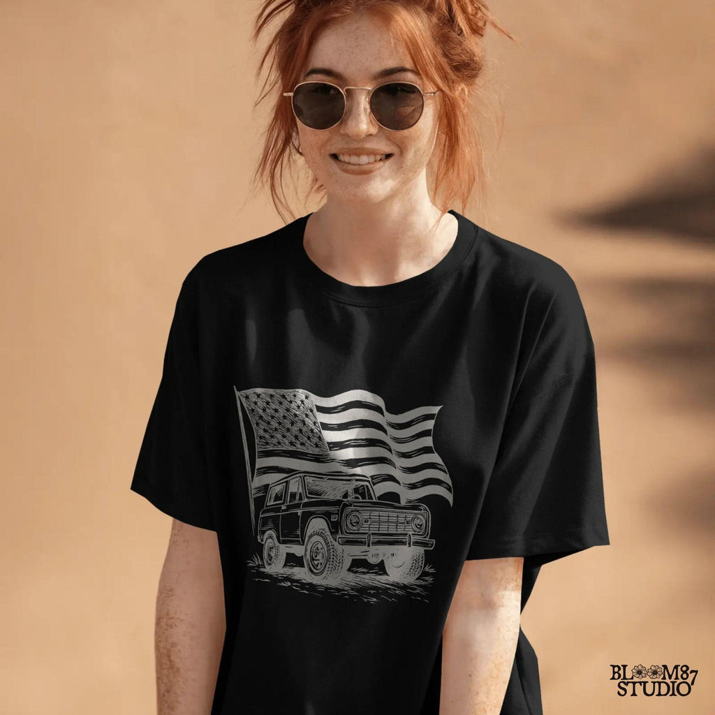 Vintage Bronco 4x4 truck with a waving rustic American flag in the background, drawn in a rugged western style with patriotic colors.