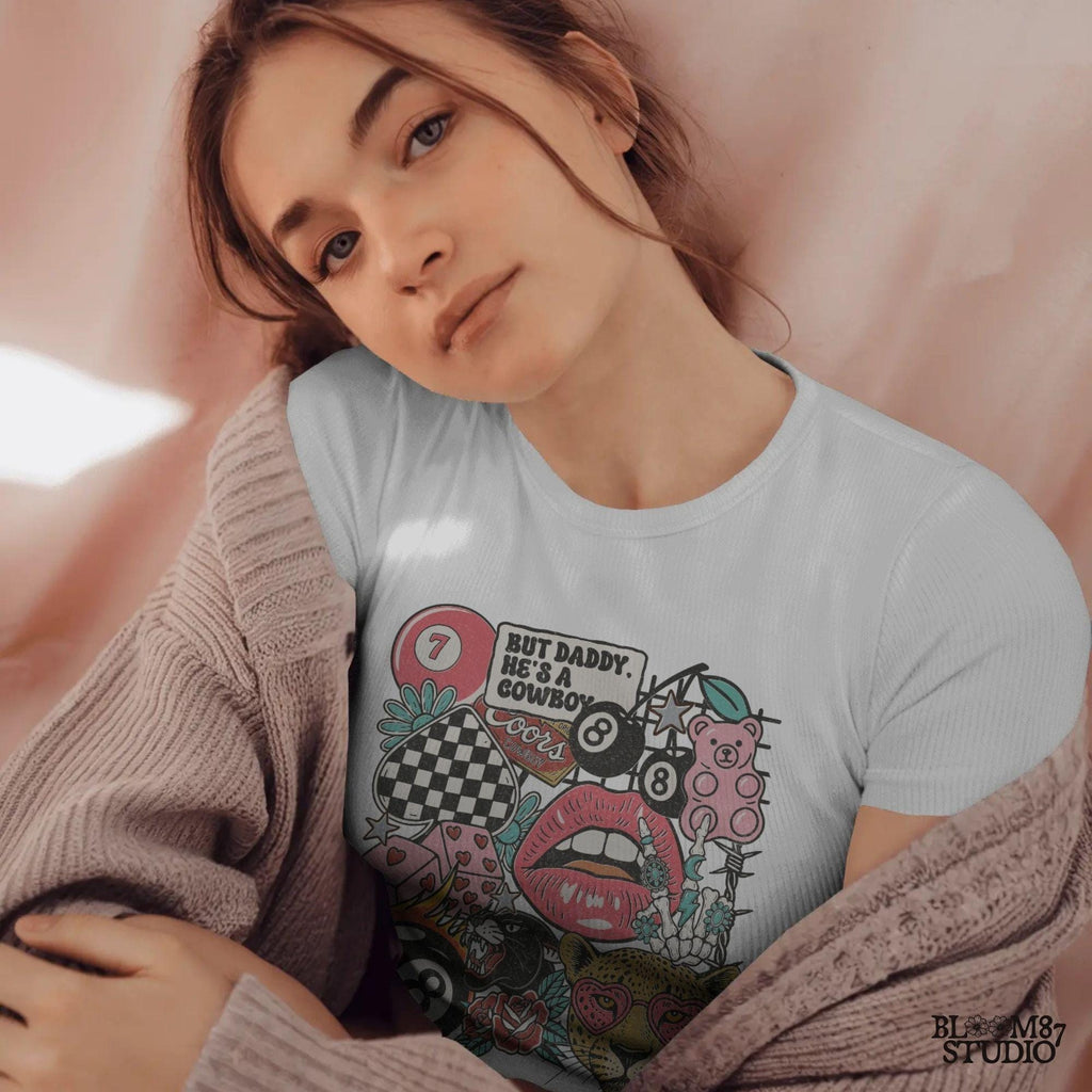 Western howdy collage PNG with “But Daddy He’s a Cowboy” quote, leopard with heart sunglasses, lips, 8 balls, dice, pink bear, and checkerboard.