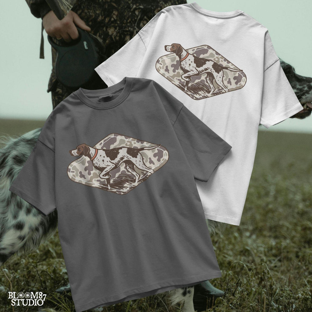 Illustration of a pointer hunting dog in a classic pointing stance on a vintage camo background, designed for upland hunting and outdoor-themed projects.