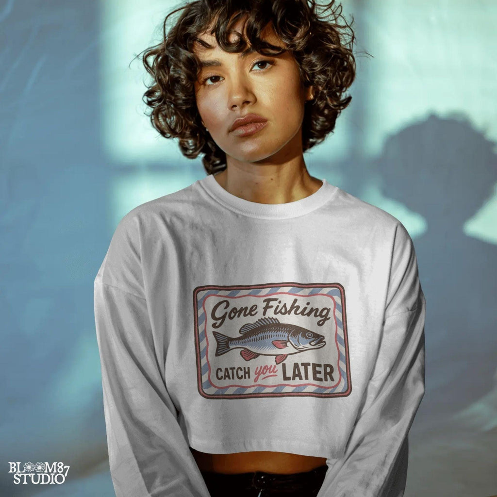 Vintage-style “Gone Fishing Catch You Later” sign with a bold blue and red fish illustration and striped border, ideal for fishing lovers.