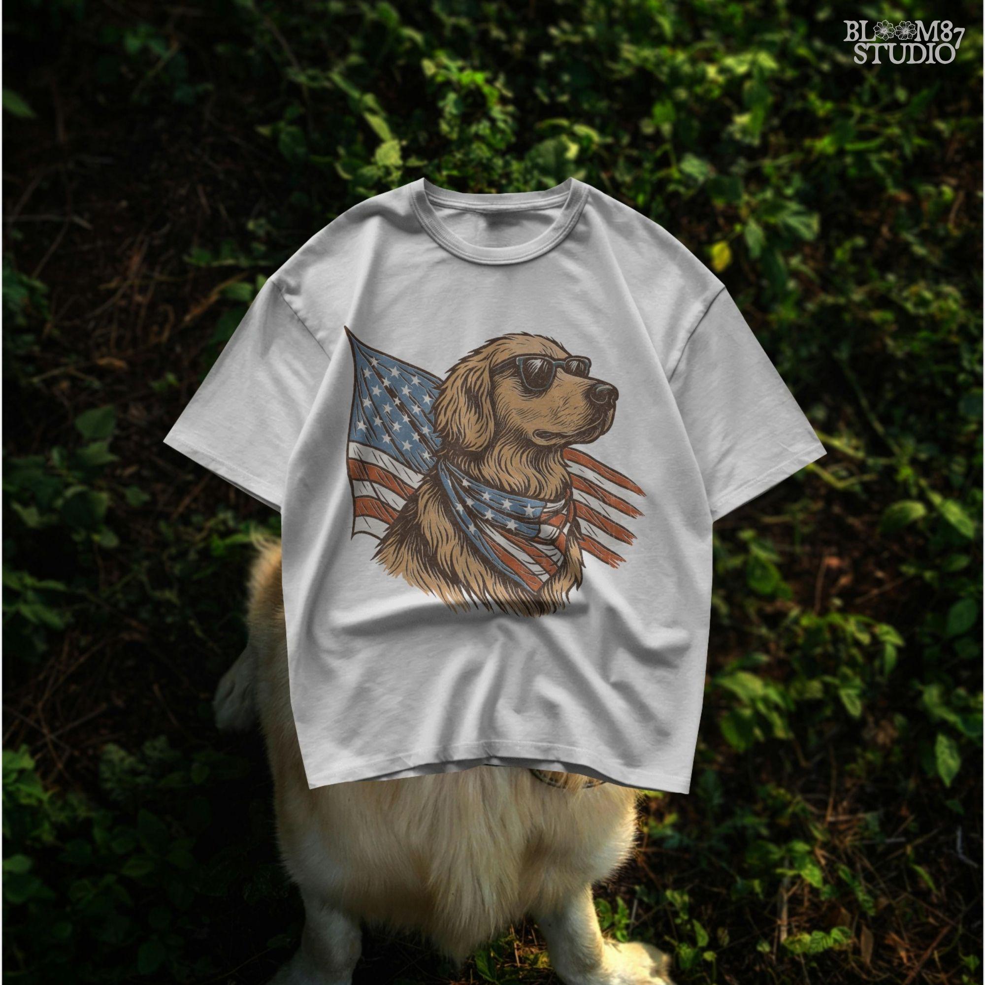 Golden retriever wearing sunglasses and American flag bandana with patriotic cape flowing behind in red, white, and blue design.