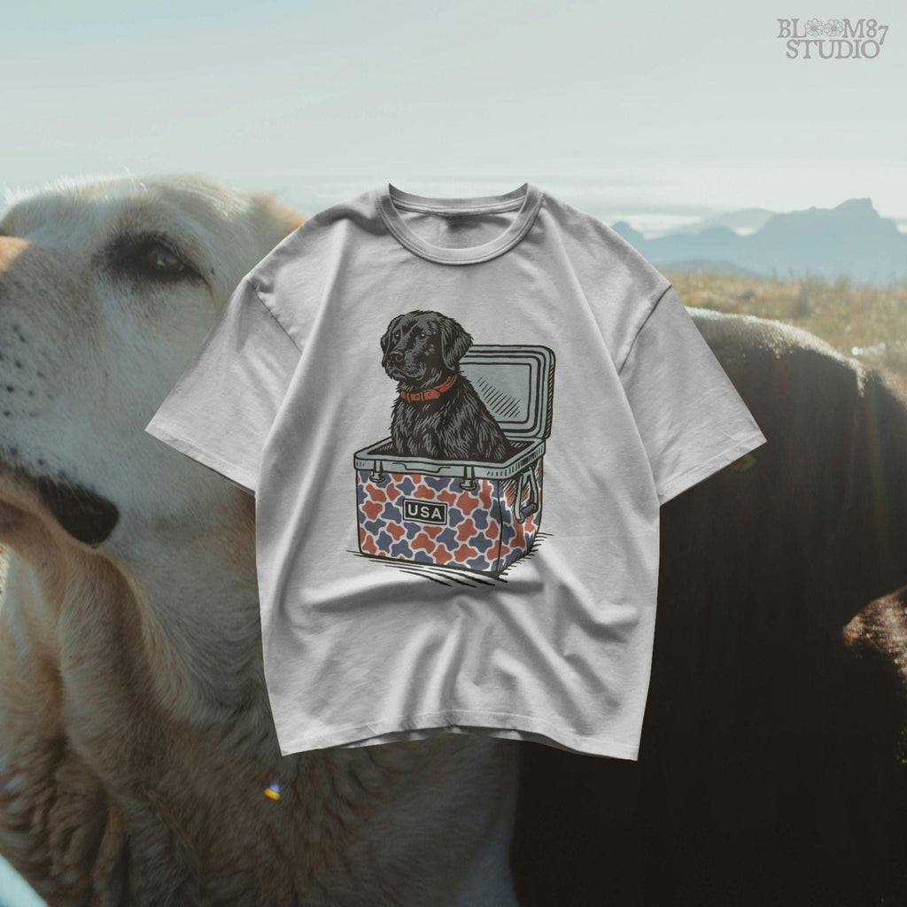 Illustration of a black Labrador retriever sitting in a red, white, and blue camo cooler with a “USA” label, designed for patriotic dog-themed sublimation.