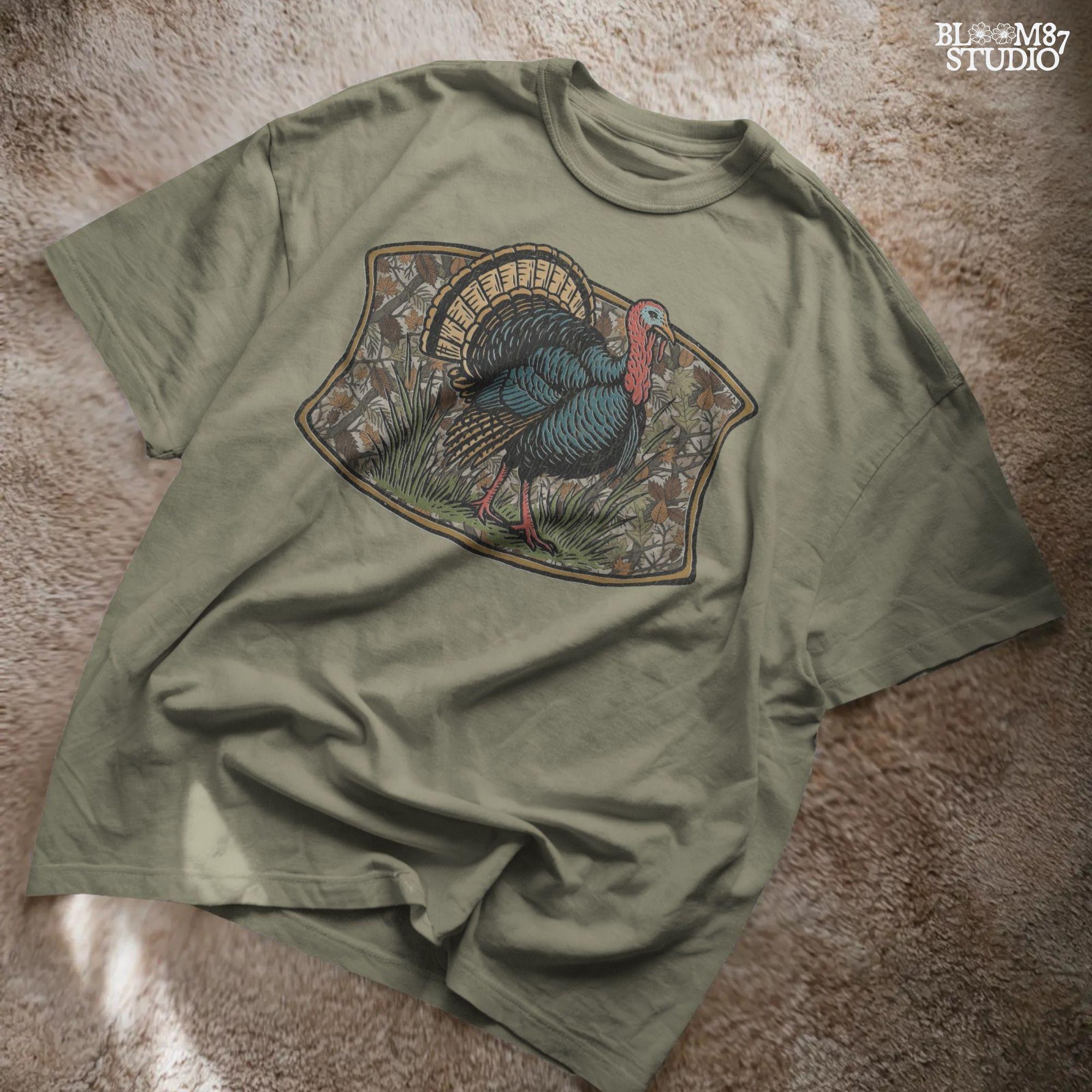 Illustration of a strutting wild turkey in front of a detailed fall camouflage background with brown and orange leaves, designed for sublimation on hunting shirts and Thanksgiving outdoor gear.