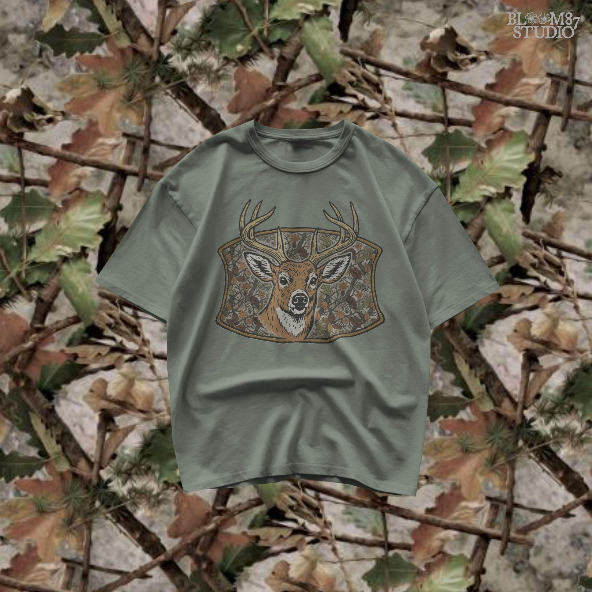 Illustration of a whitetail buck with large antlers in front of a fall forest camo background featuring leaves and branches, perfect for hunting-themed sublimation.