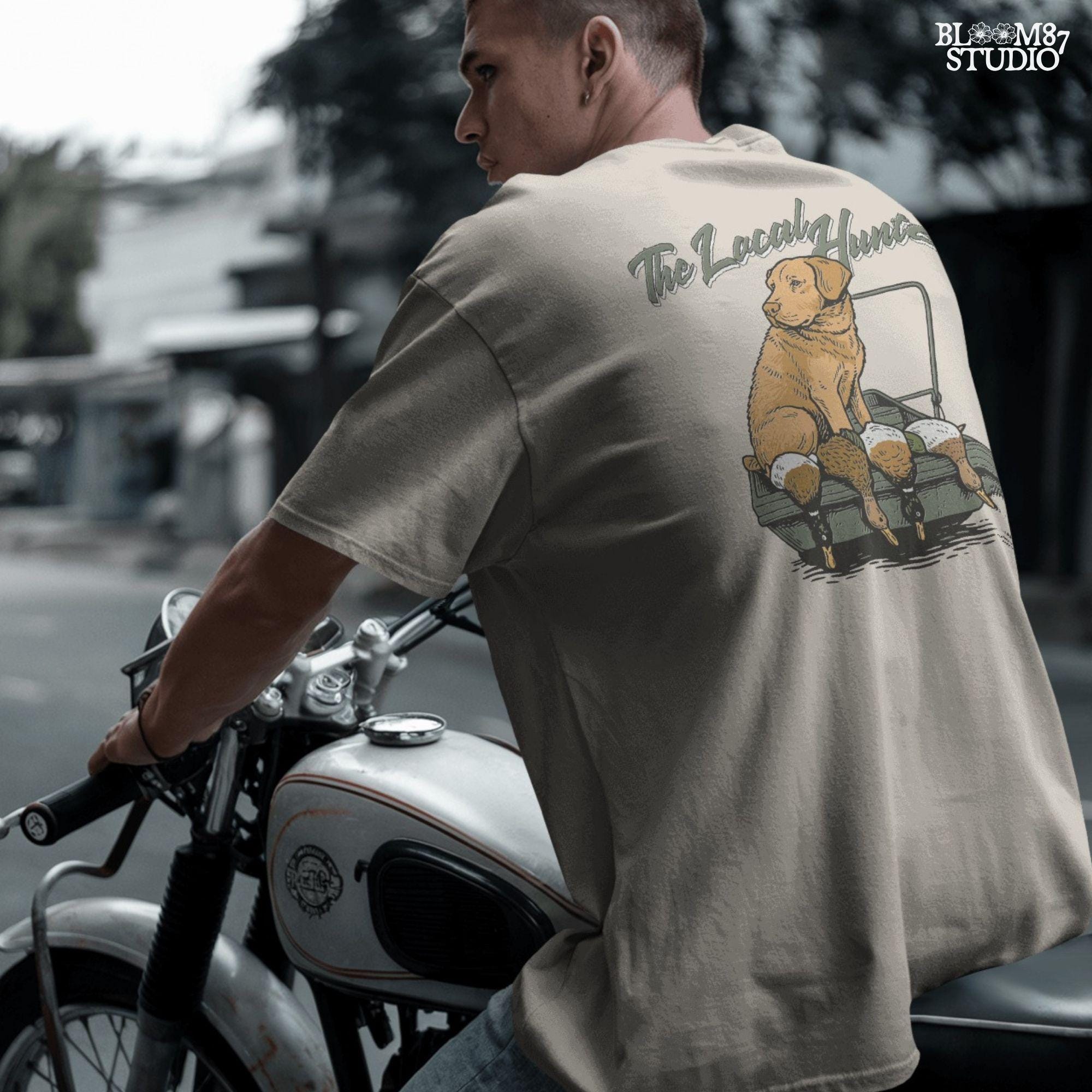 Vintage-style Labrador Retriever sitting in a duck boat with four mallards, text reads “The Local Hunter”, PNG for duck hunting apparel and sublimation.