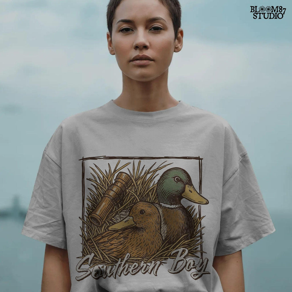 Vintage-style illustration of two mallard ducks in grass with a duck call and “Southern Boy” text – rustic duck hunting PNG for sublimation.