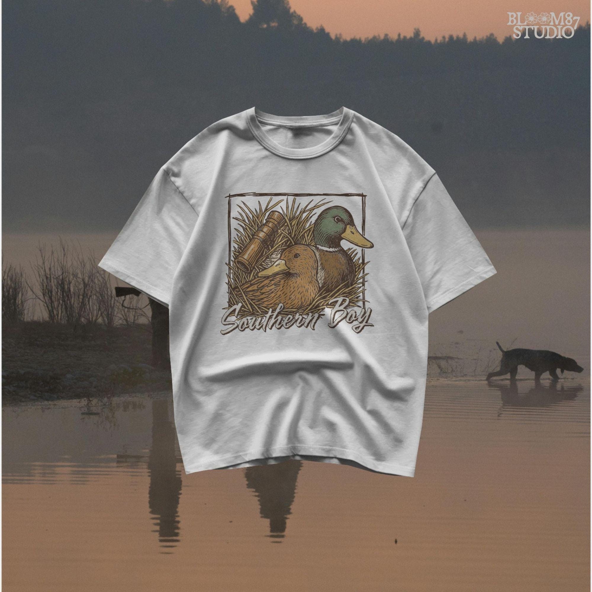 Vintage-style illustration of two mallard ducks in grass with a duck call and “Southern Boy” text – rustic duck hunting PNG for sublimation.