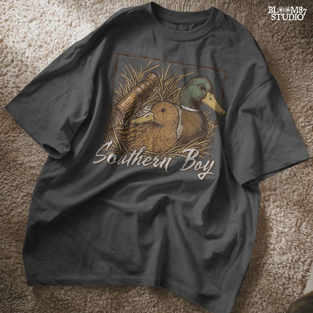 Vintage-style illustration of two mallard ducks in grass with a duck call and “Southern Boy” text – rustic duck hunting PNG for sublimation.