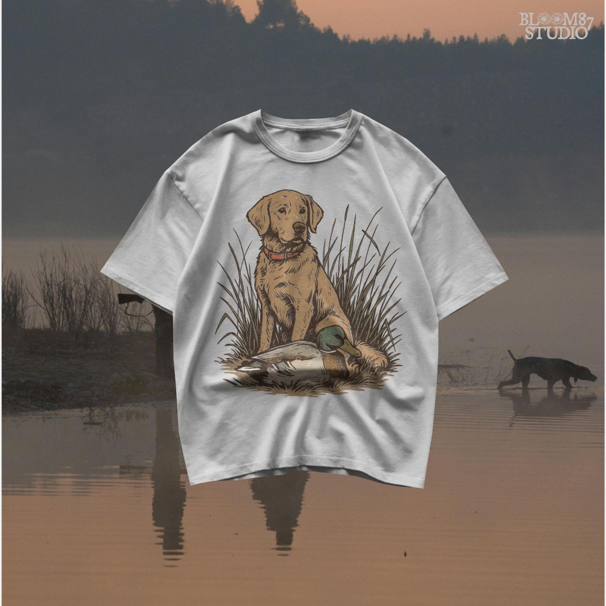 Vintage illustration of a golden Labrador Retriever sitting in grass beside a mallard duck – rustic hunting dog PNG for sublimation and crafts.