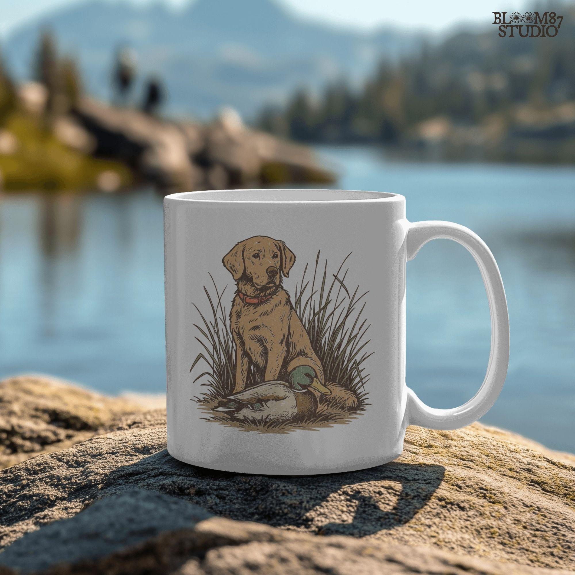 Vintage illustration of a golden Labrador Retriever sitting in grass beside a mallard duck – rustic hunting dog PNG for sublimation and crafts.