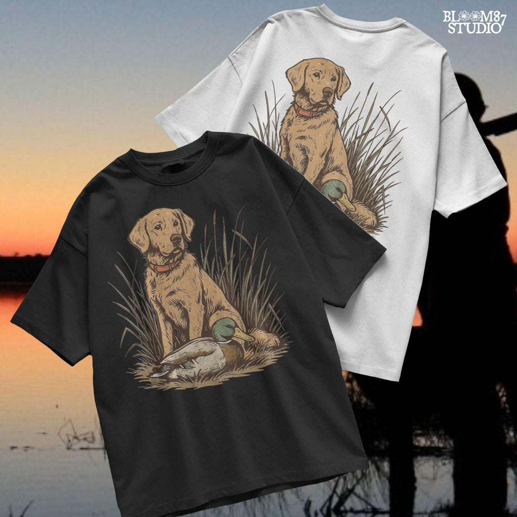 Vintage illustration of a golden Labrador Retriever sitting in grass beside a mallard duck – rustic hunting dog PNG for sublimation and crafts.