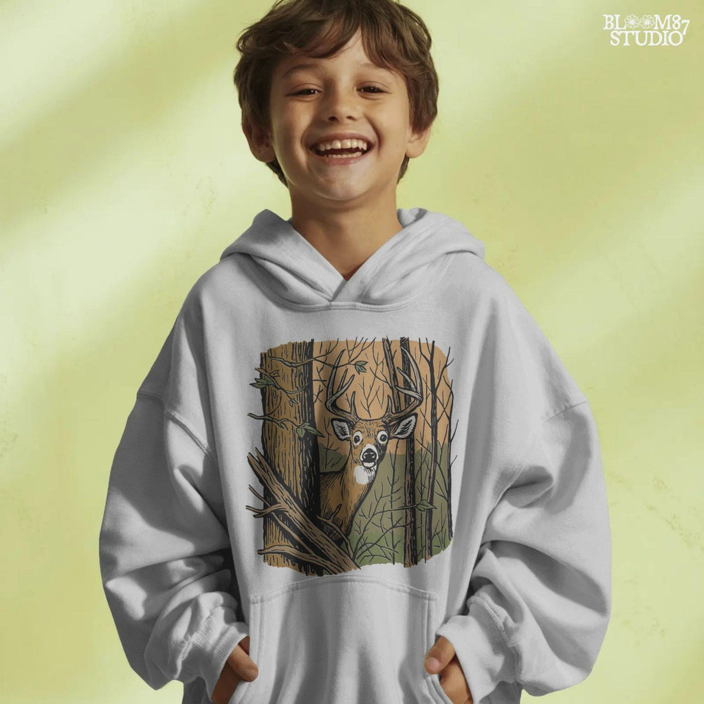 Vintage-style illustration of a buck deer peeking from behind a tree in a forest, designed for hunting season or rustic wildlife sublimation projects.