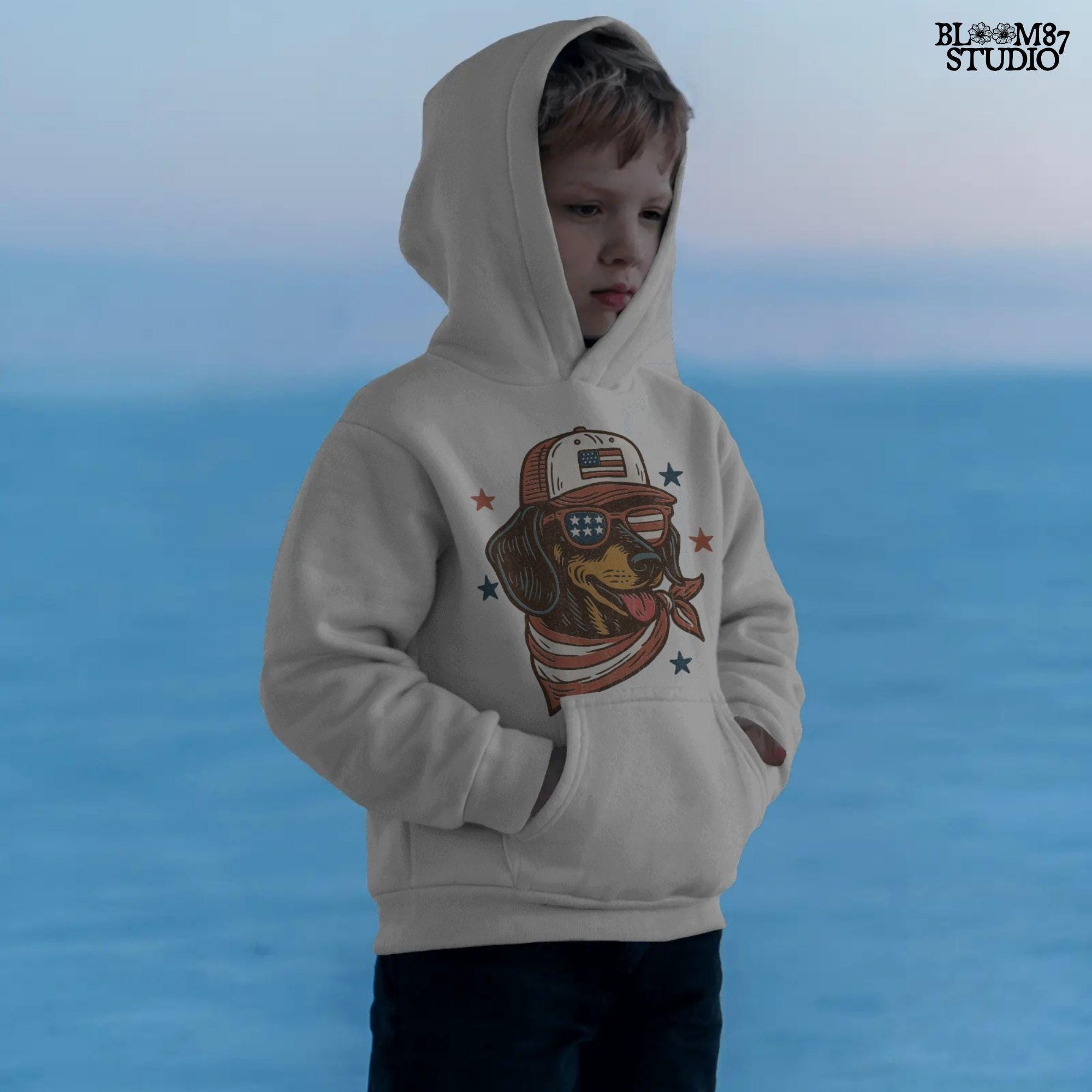 Dachshund dog wearing USA flag hat, sunglasses, and bandana – patriotic 4th of July PNG design for dog lovers and sublimation crafts.