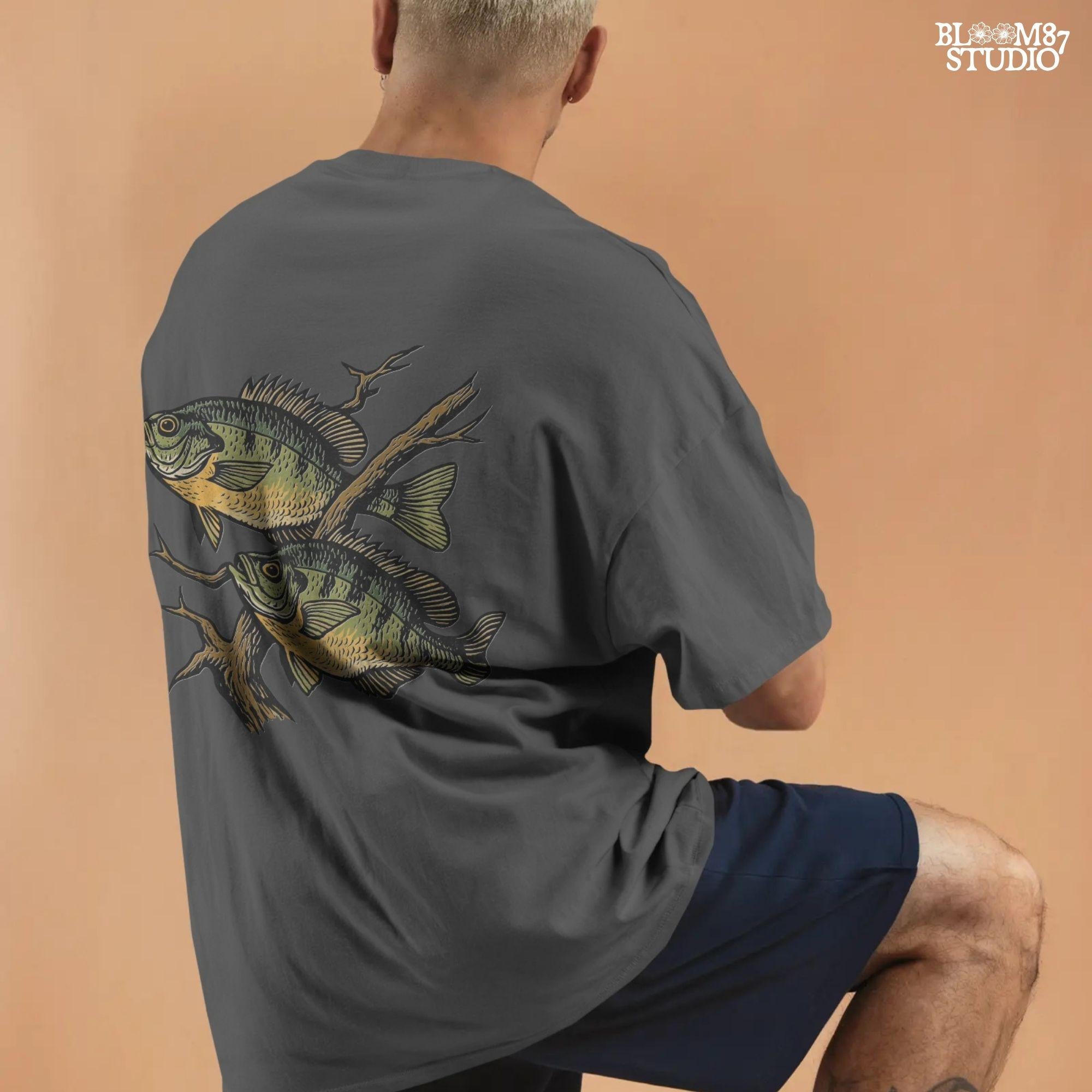 Two vintage-style bluegill fish swimming with underwater branches – realistic rustic PNG for sublimation shirts, signs, and fishing gifts.