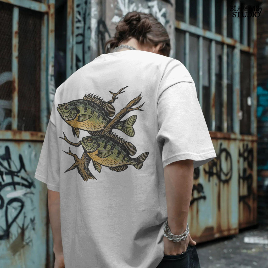 Two vintage-style bluegill fish swimming with underwater branches – realistic rustic PNG for sublimation shirts, signs, and fishing gifts.