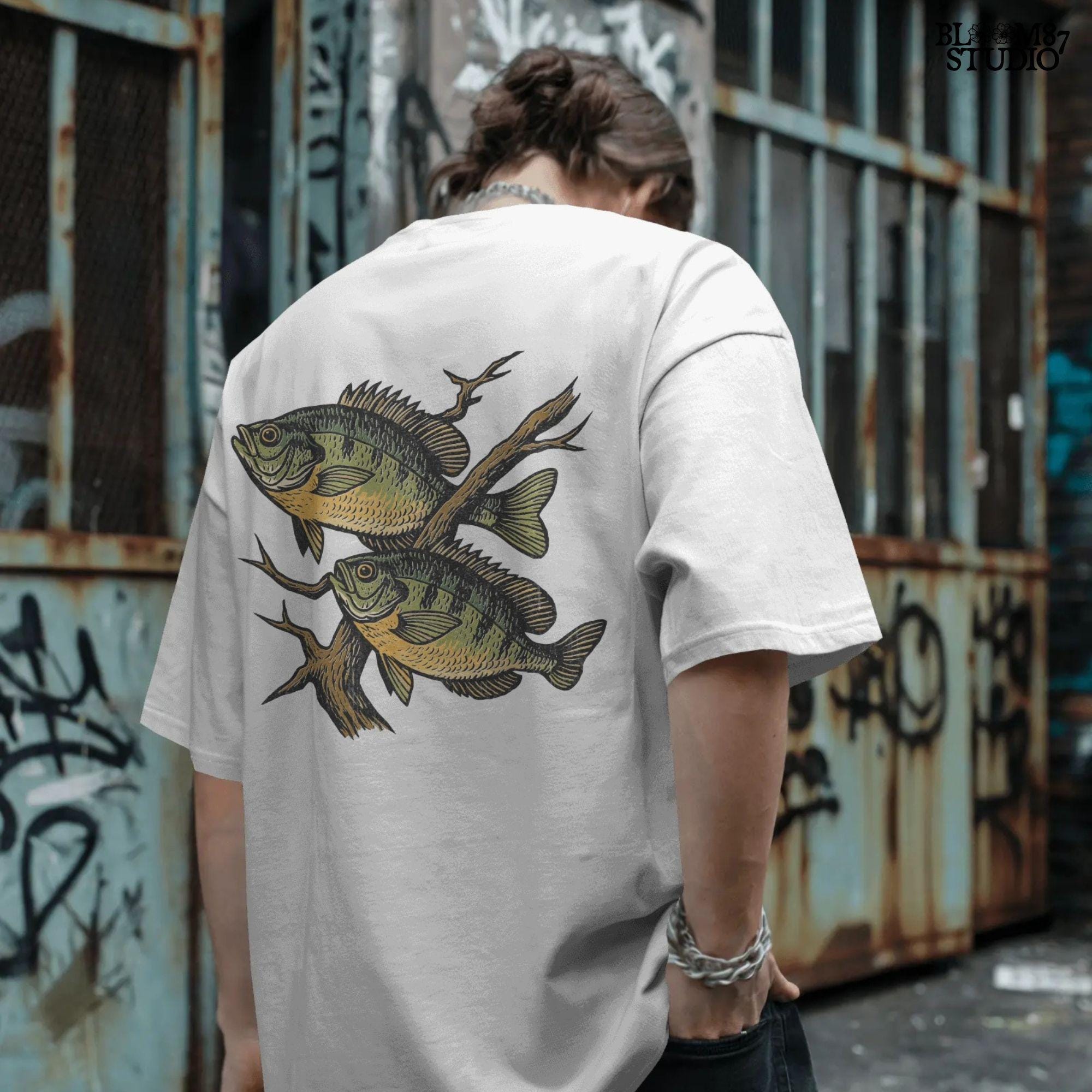 Two vintage-style bluegill fish swimming with underwater branches – realistic rustic PNG for sublimation shirts, signs, and fishing gifts.