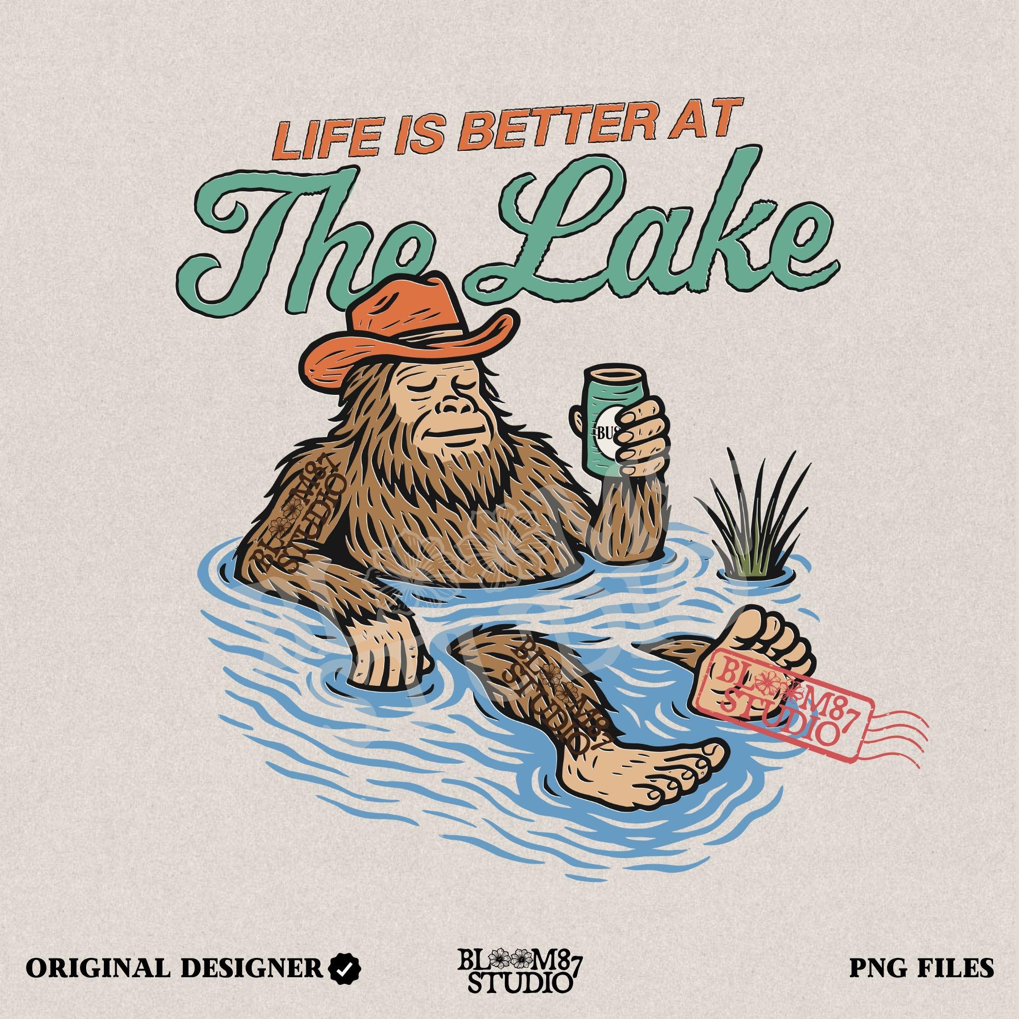 Cartoon Bigfoot relaxing in a lake wearing a cowboy hat, holding a beer can, with retro text saying “Life is Better at the Lake”