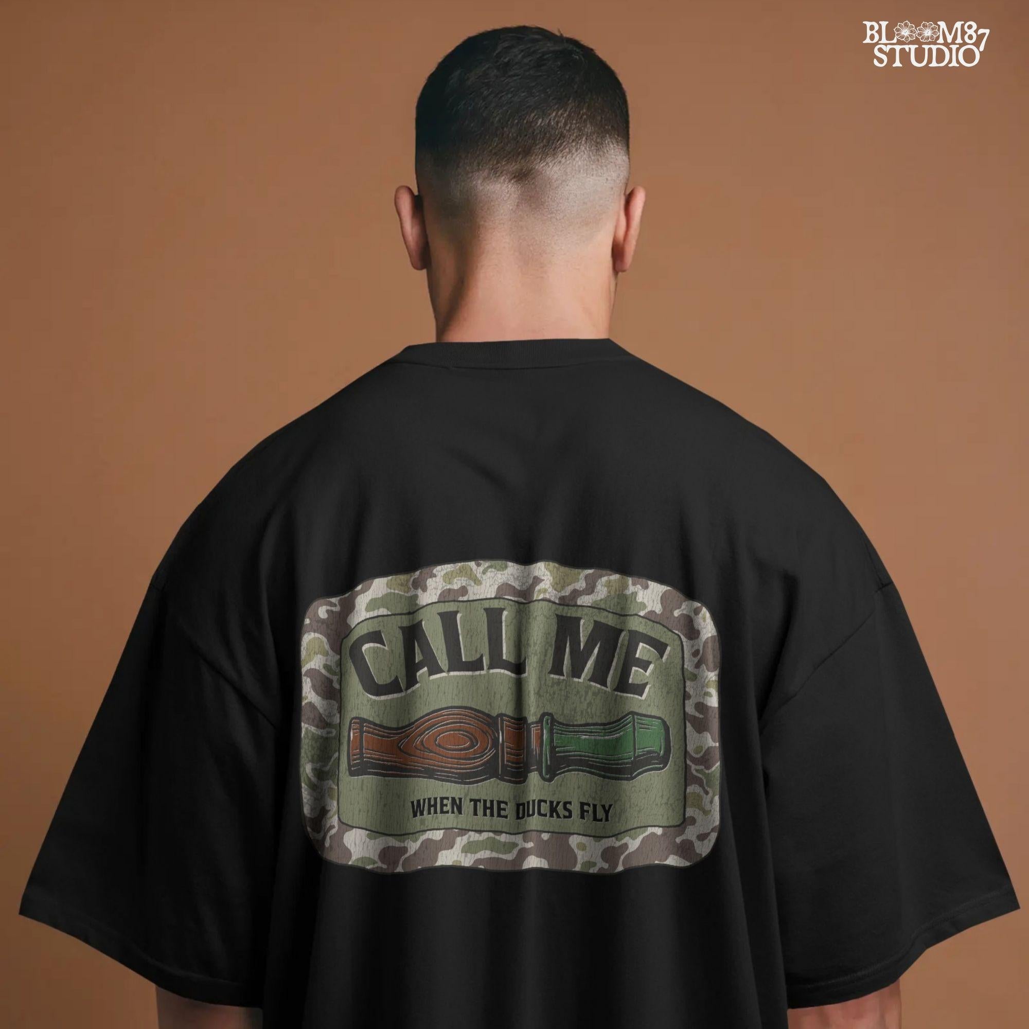 Sublimation PNG design featuring a duck call with camo border and the phrase “Call Me When The Ducks Fly” for hunting or outdoors shirts