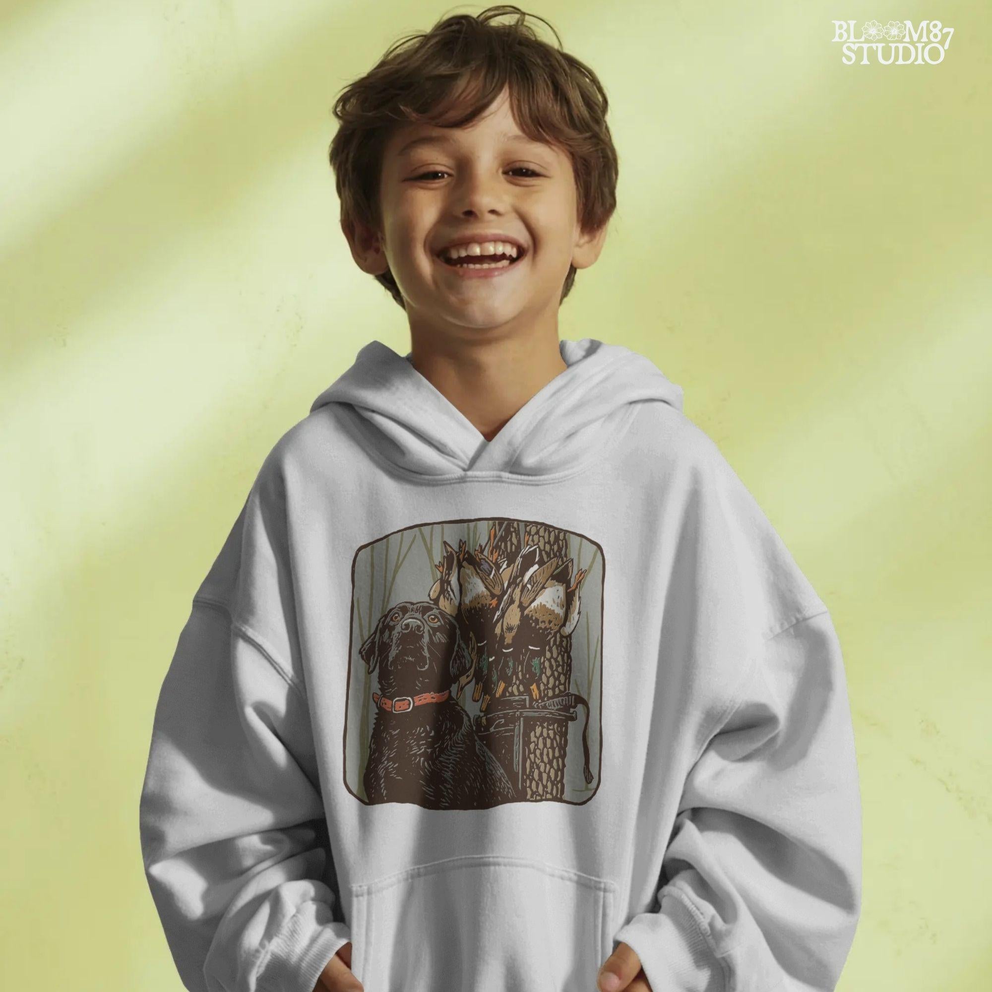 Digital PNG design of a black lab hunting dog with mallard ducks on a strap, ideal for sublimation printing on hunting-themed apparel