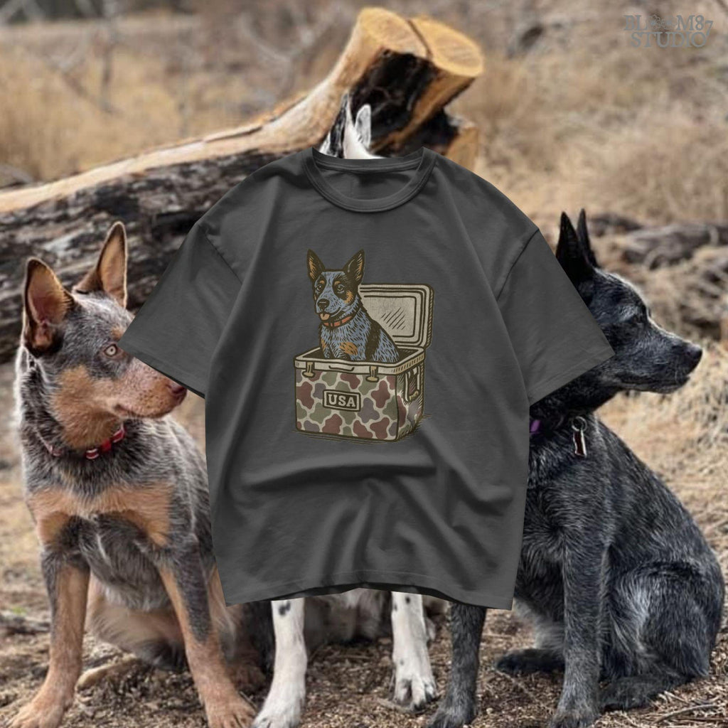 Blue Heeler Australian Cattle Dog sitting in USA camouflage ice chest cooler, patriotic digital PNG for sublimation designs.