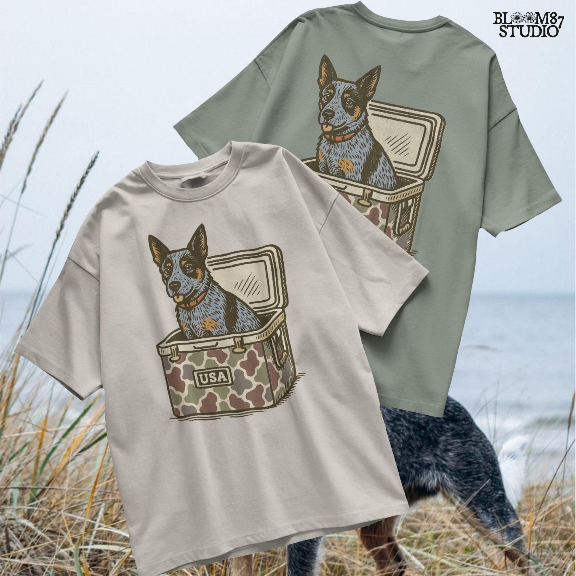 Blue Heeler Australian Cattle Dog sitting in USA camouflage ice chest cooler, patriotic digital PNG for sublimation designs.