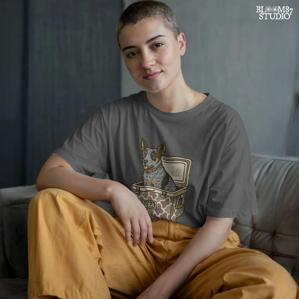 Blue Heeler Australian Cattle Dog sitting in USA camouflage ice chest cooler, patriotic digital PNG for sublimation designs.