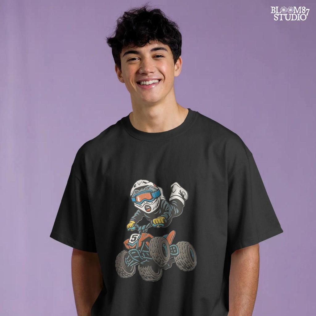 Digital PNG of a boy riding an ATV mid-jump wearing motocross gear and helmet, perfect for kids racing sublimation projects.