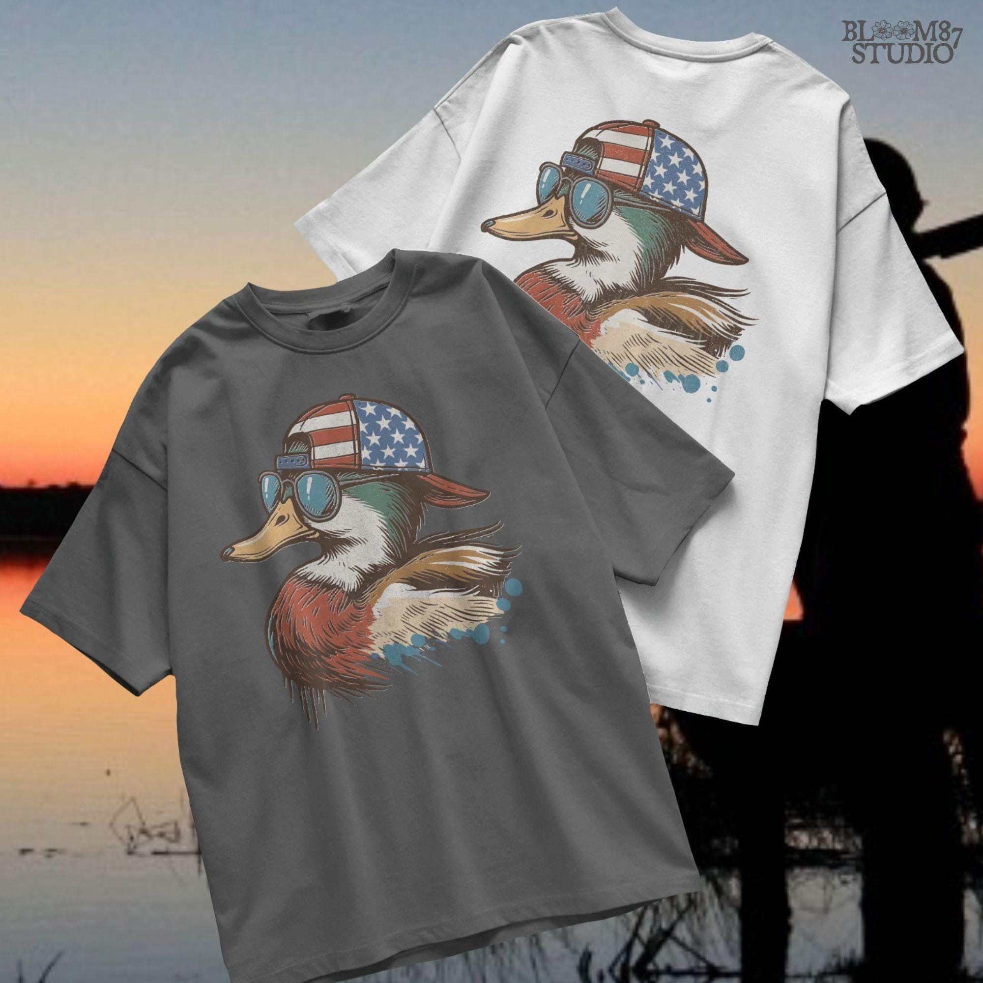 Cartoon mallard duck wearing American flag hat and sunglasses in a humorous patriotic style, with bold colors and splash detail