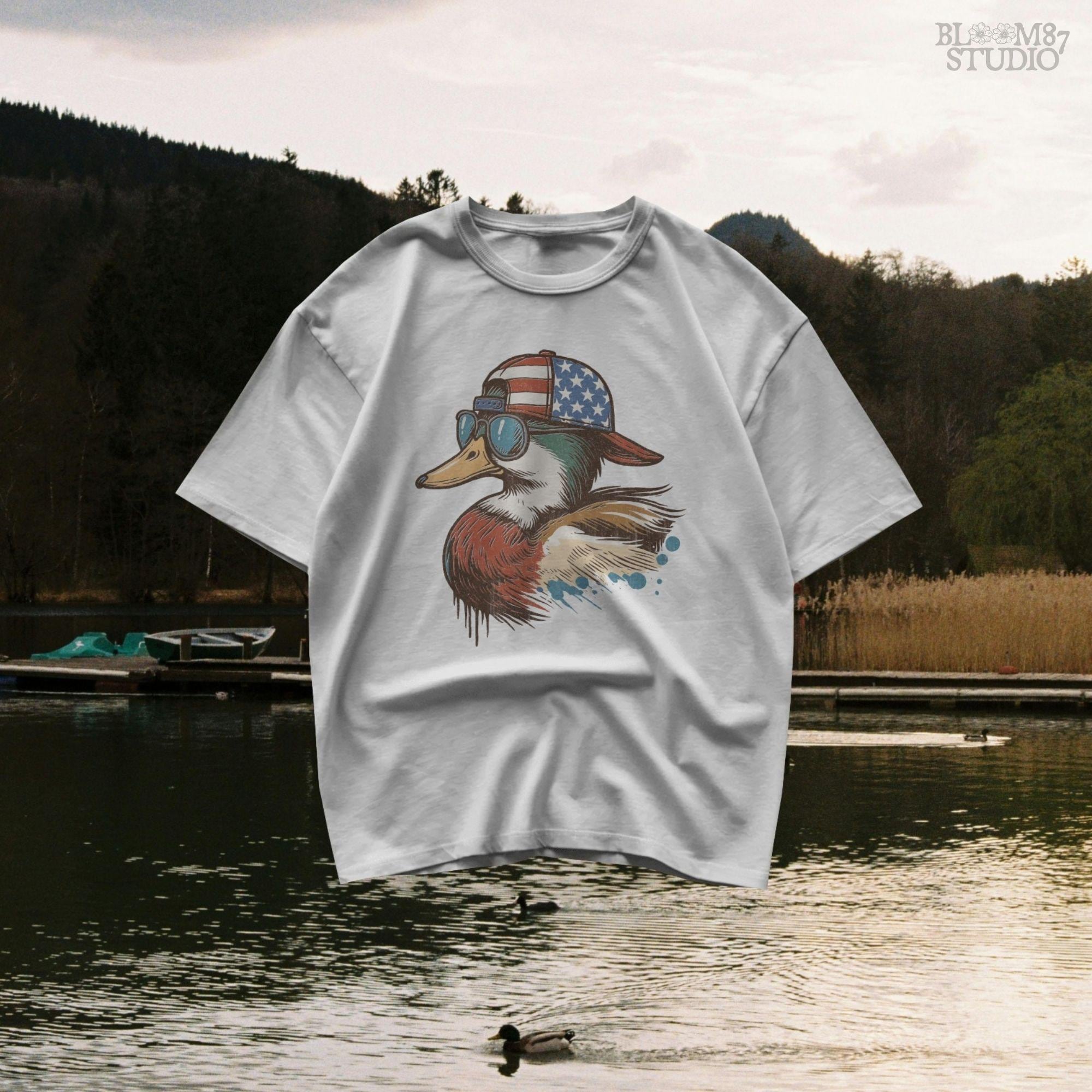 Cartoon mallard duck wearing American flag hat and sunglasses in a humorous patriotic style, with bold colors and splash detail