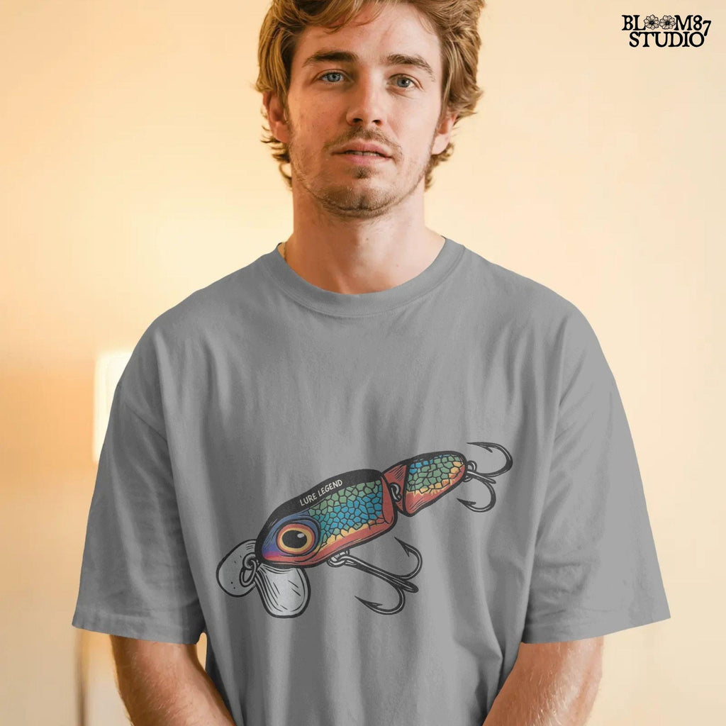 Colorful vintage fishing lure with rainbow scale pattern, metal hooks, and “Lure Legend” text – designed in bold cartoon style