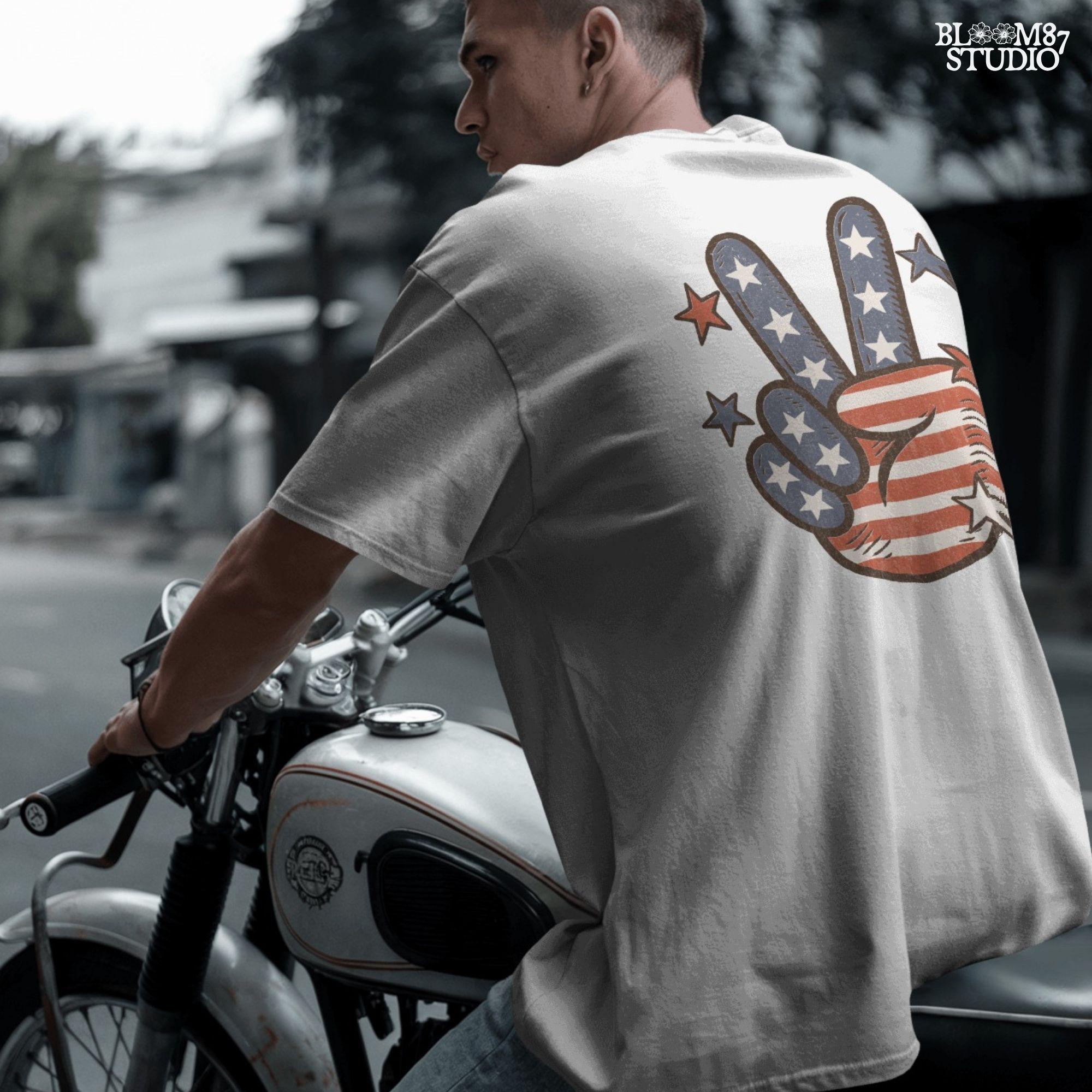 Peace hand symbol with stars and stripes in red, white, and blue American flag pattern surrounded by stars; retro patriotic sublimation art.