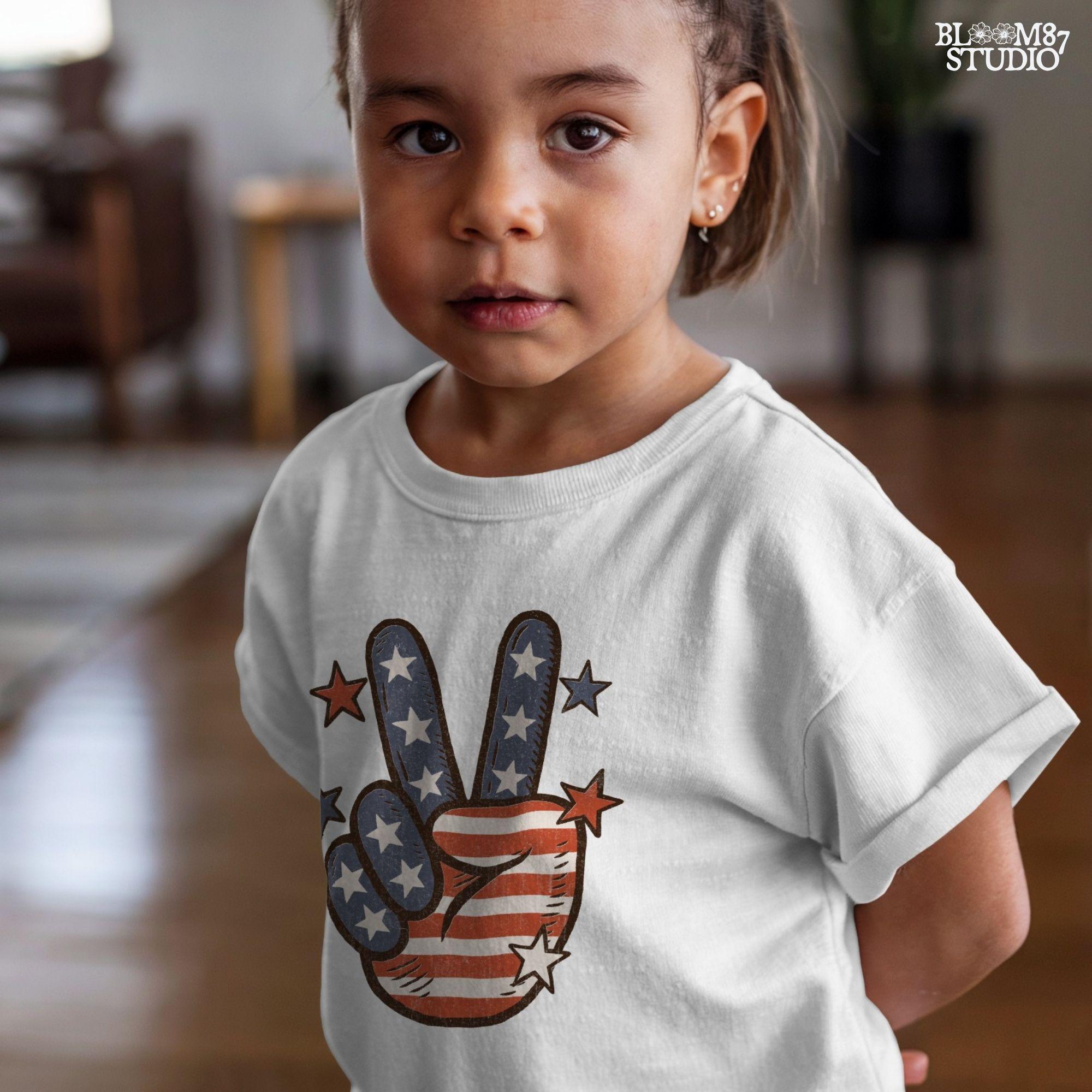 Peace hand symbol with stars and stripes in red, white, and blue American flag pattern surrounded by stars; retro patriotic sublimation art.