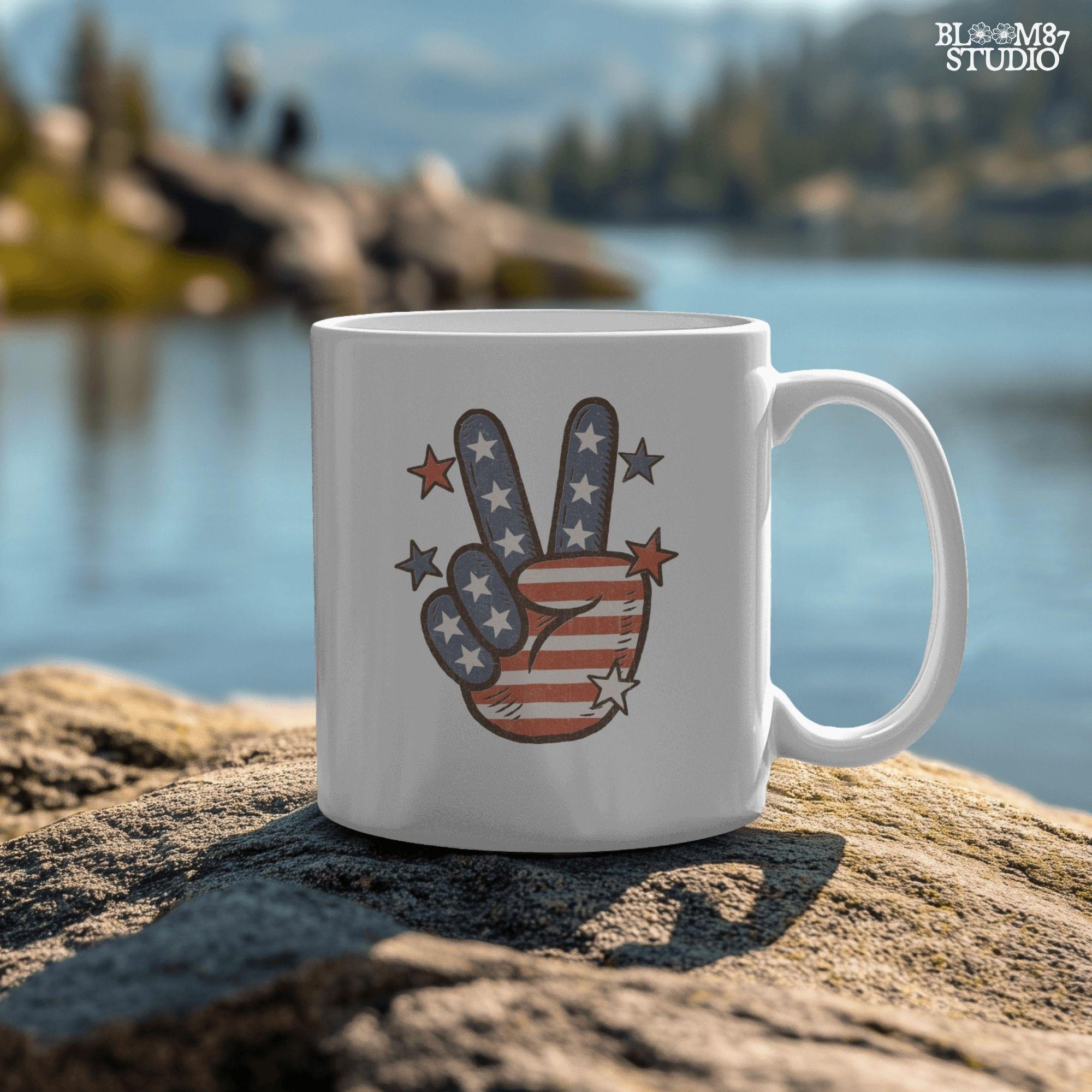 Peace hand symbol with stars and stripes in red, white, and blue American flag pattern surrounded by stars; retro patriotic sublimation art.