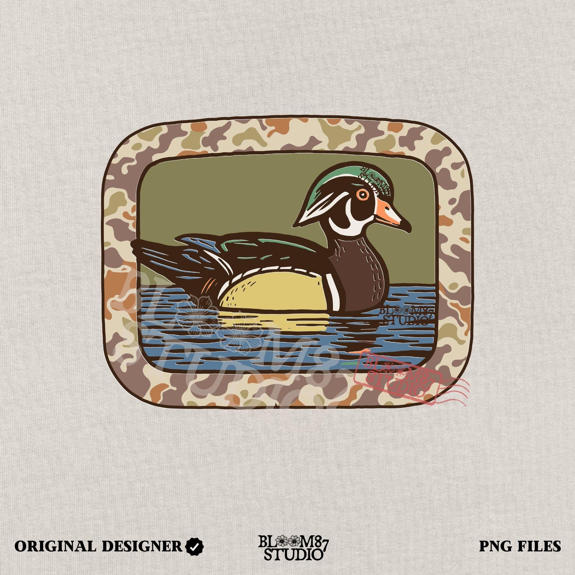 Rustic wood duck illustration with green, brown, and tan camo border; sublimation PNG for hunting or wildlife-themed crafts and apparel.