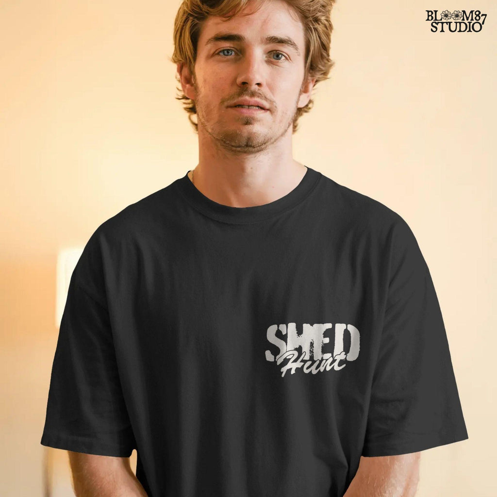 Black Labrador retriever running with a deer shed antler in its mouth, with bonus “Shed Hunt” circular pocket badge in rustic style