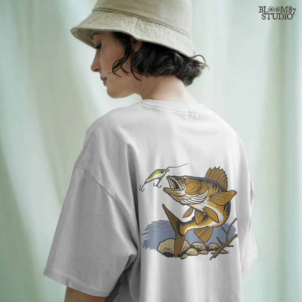 Walleye fish underwater lunging toward a fishing lure near lake rocks and branches, drawn in vintage style with natural colors.