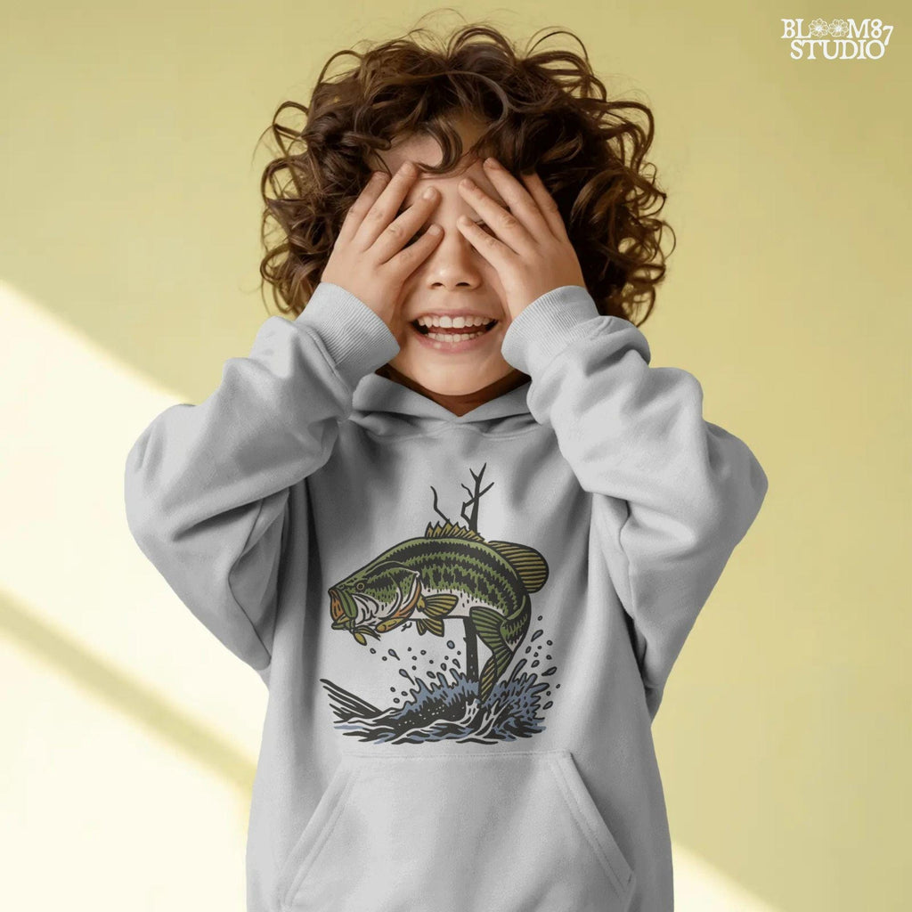 Largemouth bass fish leaping from water with a lure in its mouth, surrounded by splashing water and tree branches in a bold vintage style.