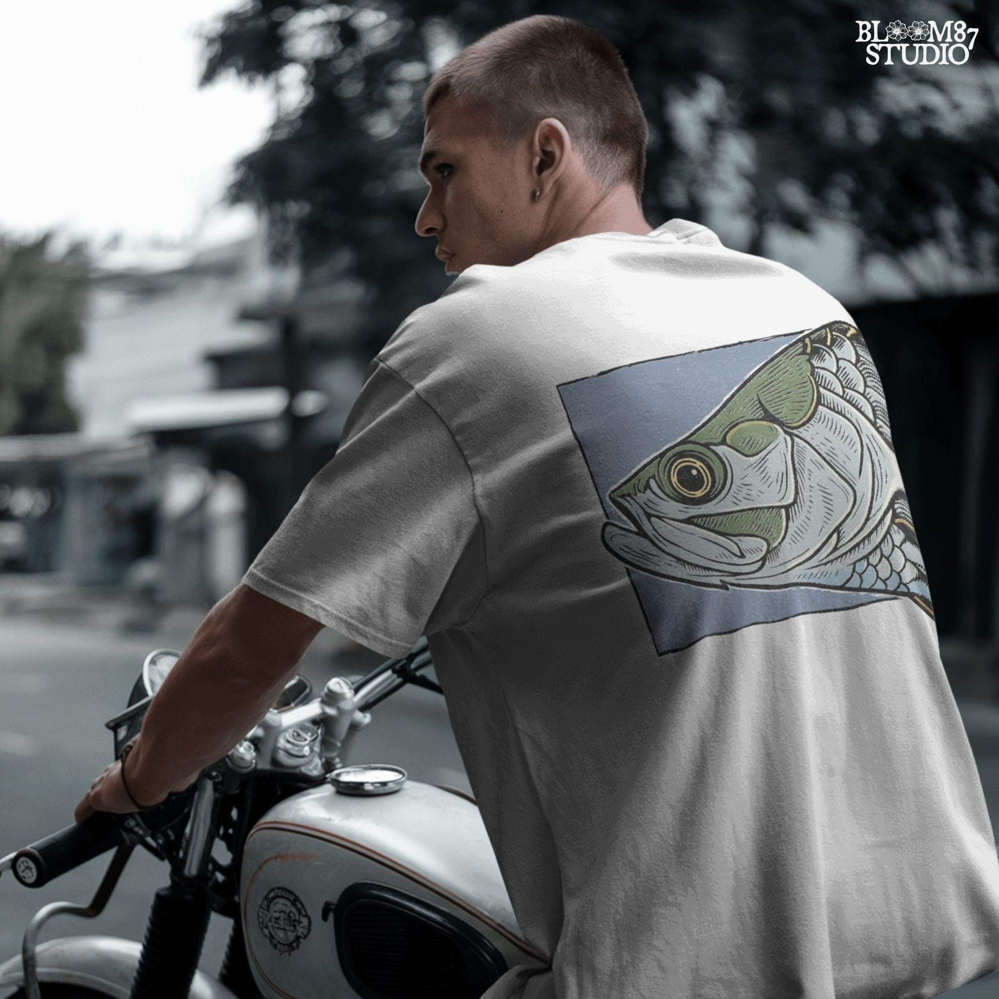 Close-up illustration of a large saltwater fish head with detailed scales, eye, fins, and vintage engraving-style shading on blue background