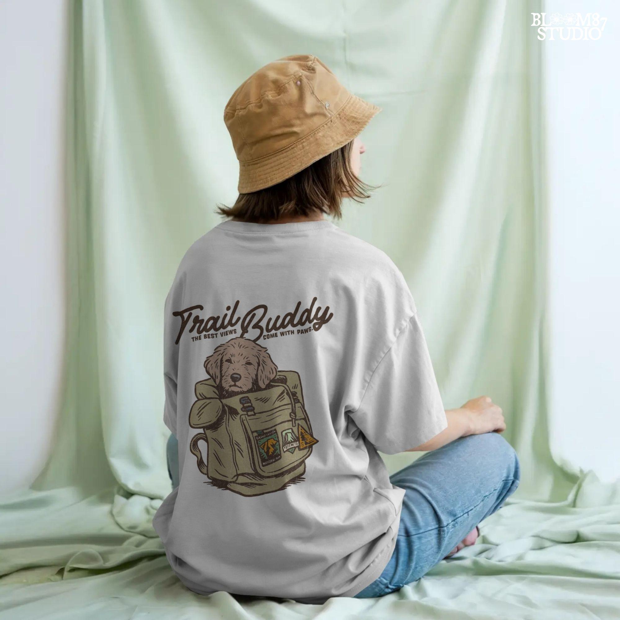 Hand-drawn illustration of a dog in a vintage hiking backpack with National Park patches and the phrase “The Best Views Come with Paws,” designed for sublimation.