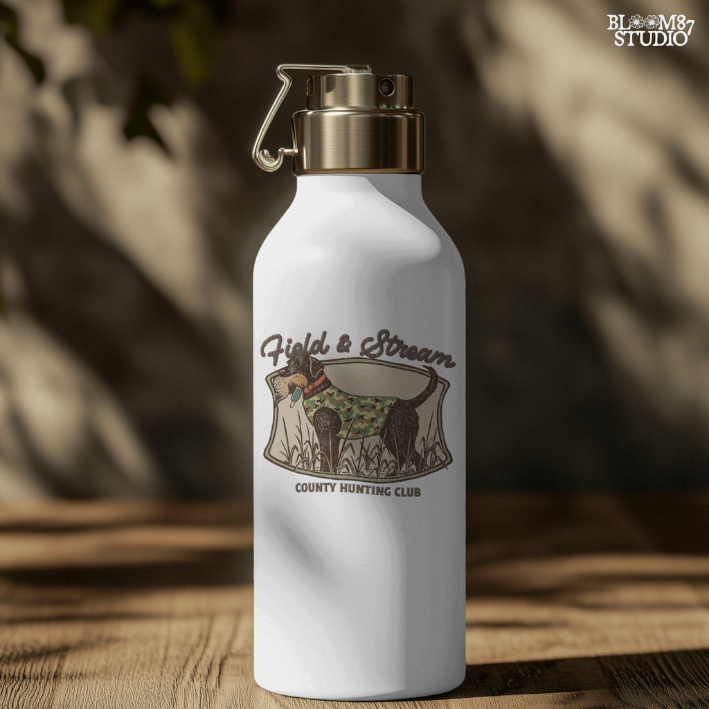 Vintage-style hunting club patch design featuring a black labrador in camo with a duck in its mouth, and the text “Field & Stream – County Hunting Club,” ideal for sublimation.