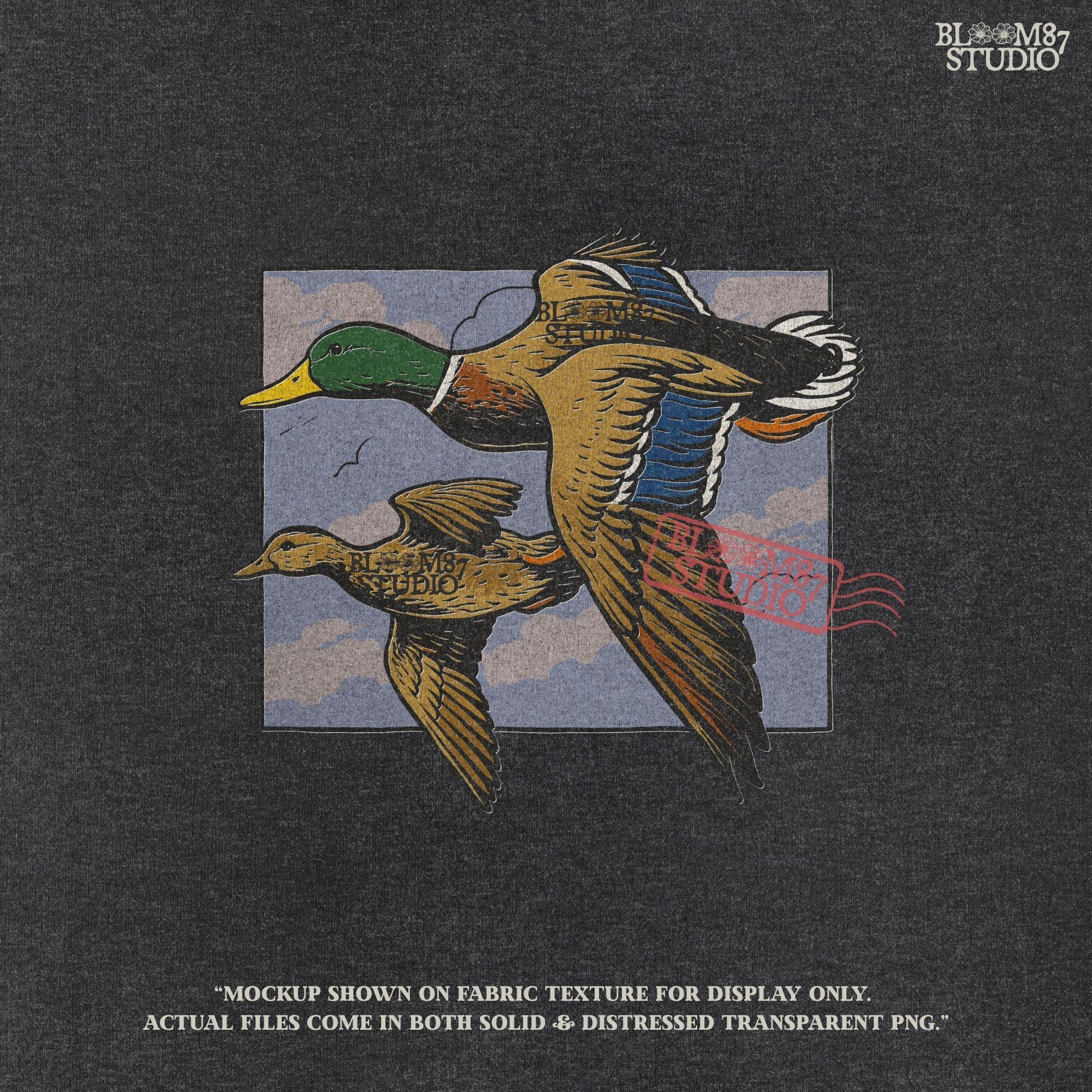 Vintage-style illustration of a flying mallard duck pair in mid-air with a cloudy sky background, ideal for rustic hunting or nature-themed designs.