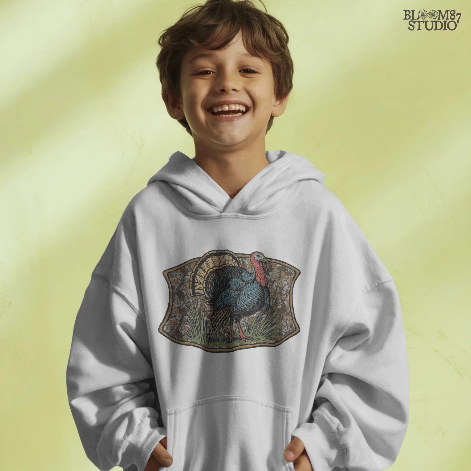 Illustration of a strutting wild turkey in front of a detailed fall camouflage background with brown and orange leaves, designed for sublimation on hunting shirts and Thanksgiving outdoor gear.