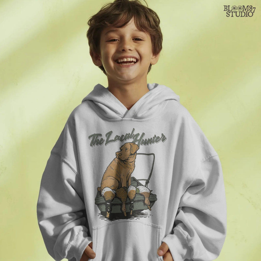 Vintage-style Labrador Retriever sitting in a duck boat with four mallards, text reads “The Local Hunter”, PNG for duck hunting apparel and sublimation.